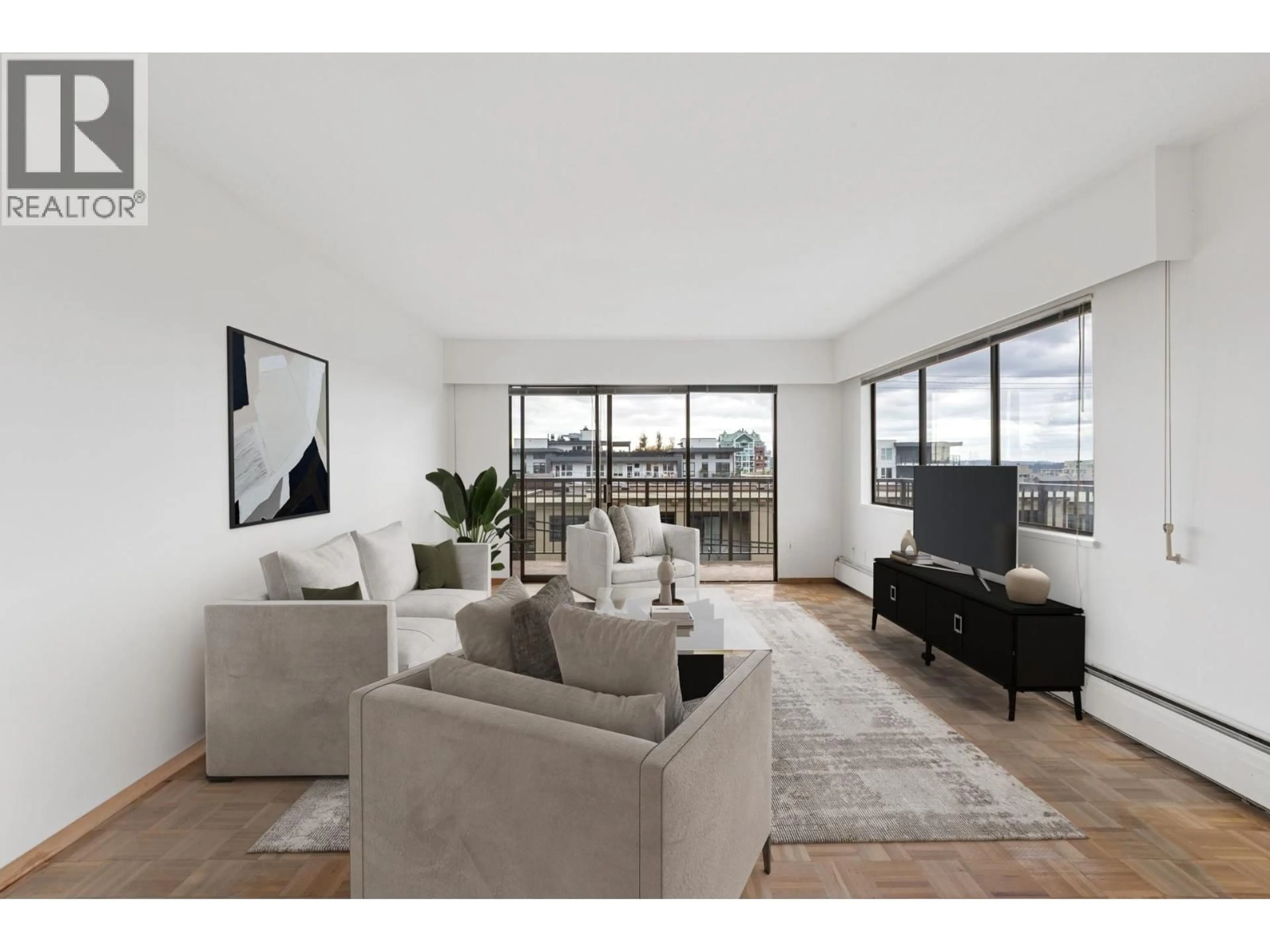 Living room with furniture, unknown for 211 - 155 5TH STREET, North Vancouver British Columbia V7L1L3