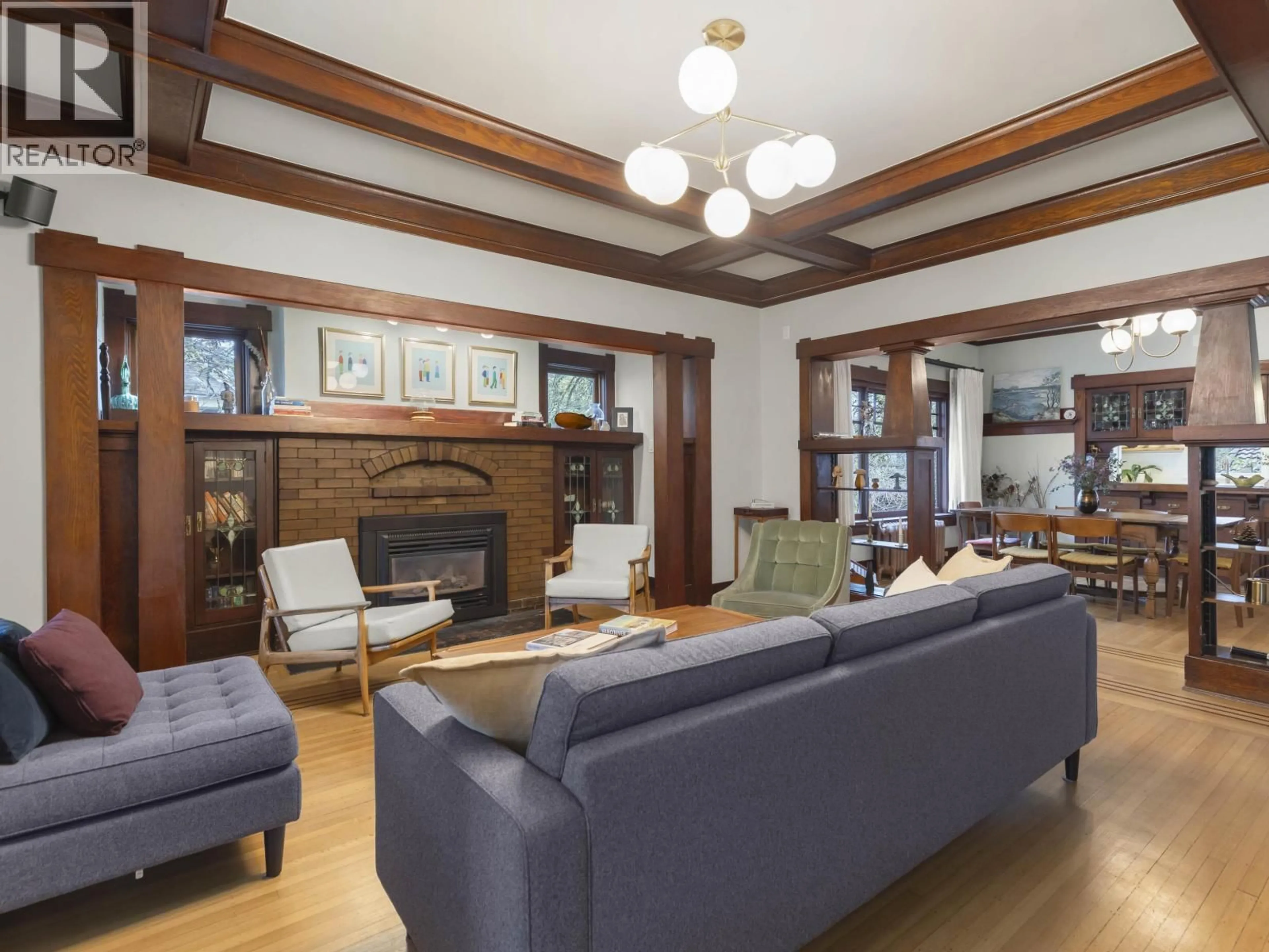 Living room with furniture, wood/laminate floor for 4691 ST. CATHERINES STREET, Vancouver British Columbia V5V4M6