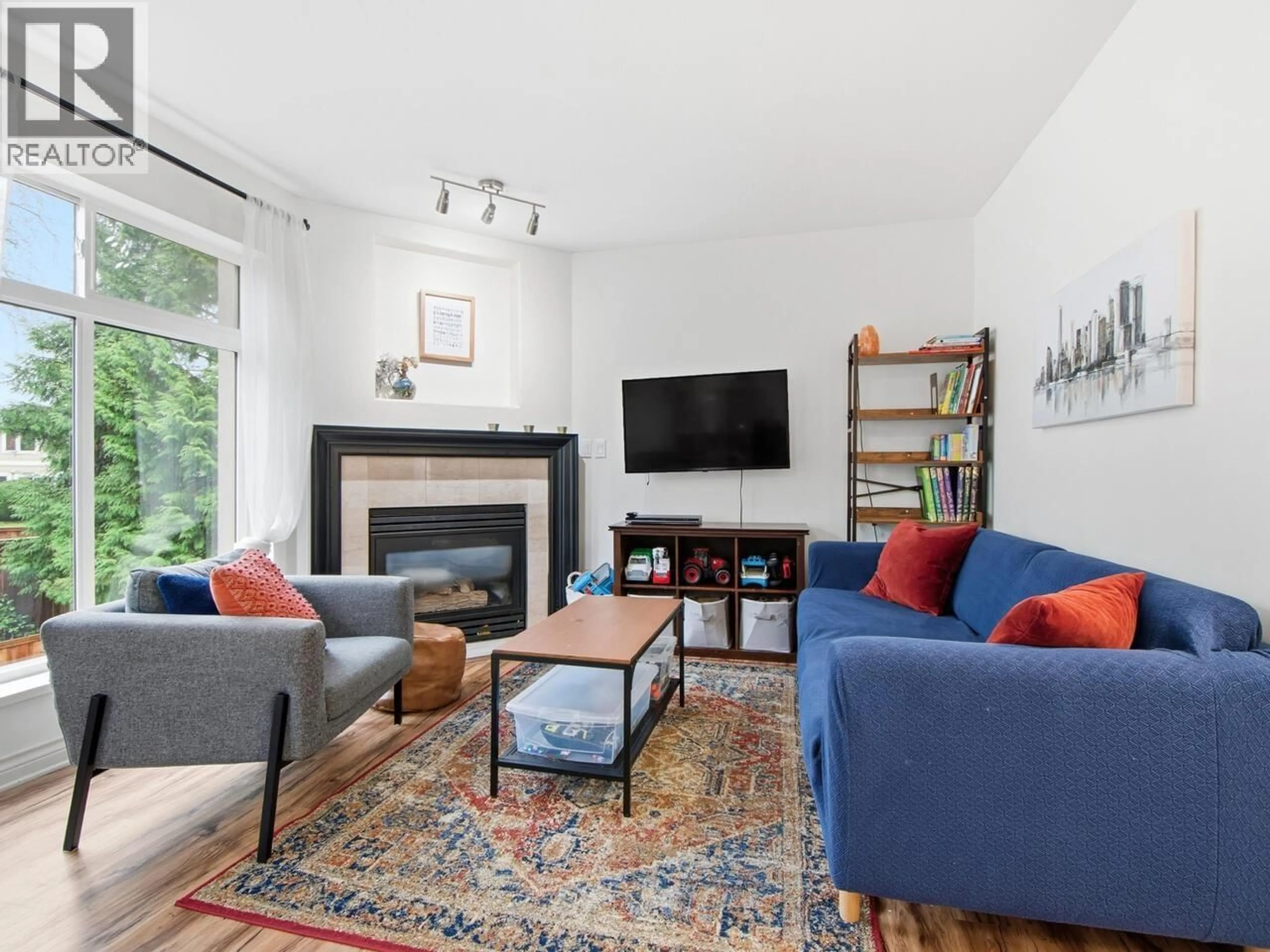 Living room with furniture, unknown for 17 - 2538 PITT RIVER ROAD, Port Coquitlam British Columbia V3C6J6