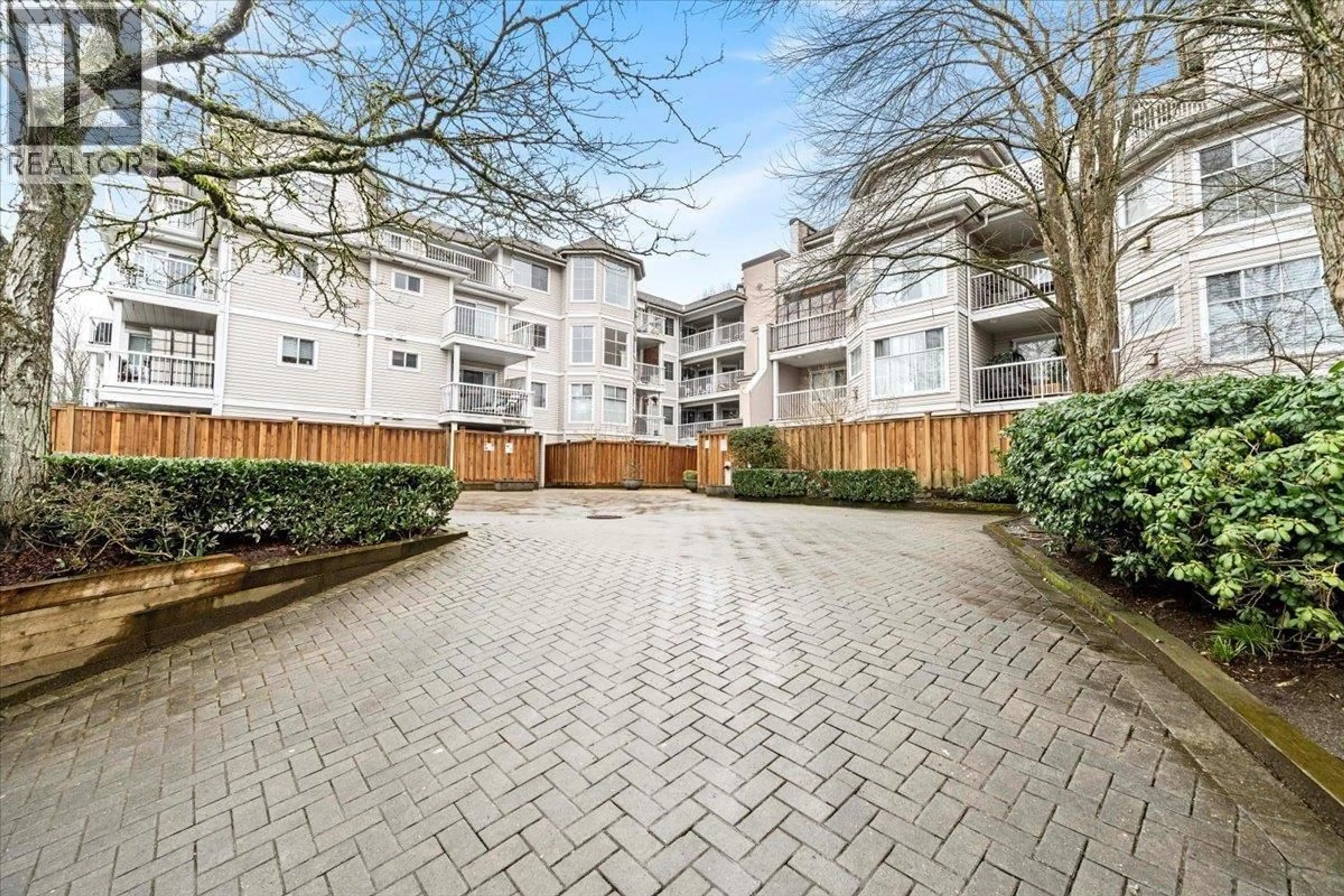 A pic from outside/outdoor area/front of a property/back of a property/a pic from drone, street for 215 - 2678 DIXON STREET, Port Coquitlam British Columbia V3C6L7