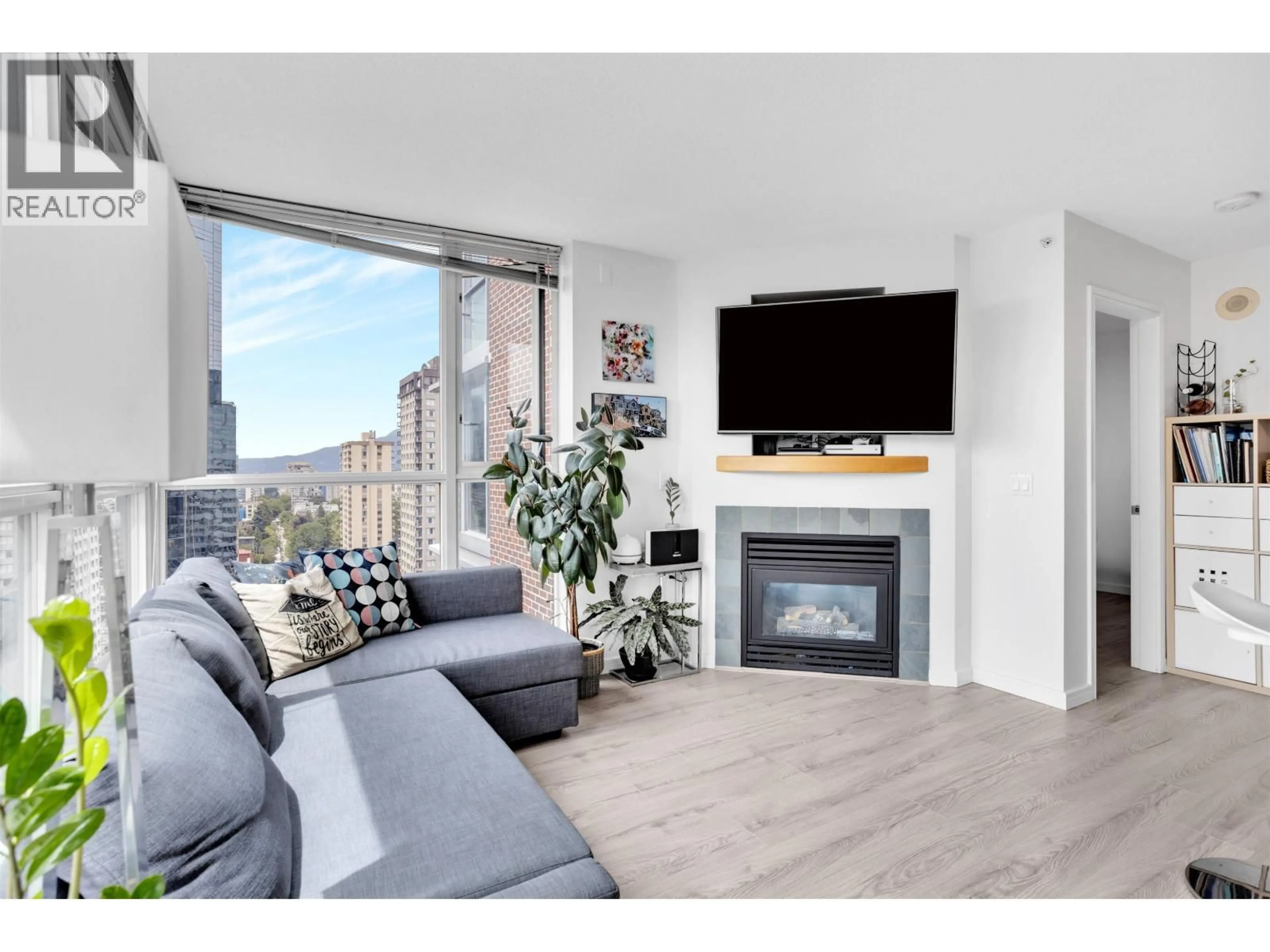 Living room with furniture, wood/laminate floor for 2507 - 1068 HORNBY STREET, Vancouver British Columbia V6Z2Y7