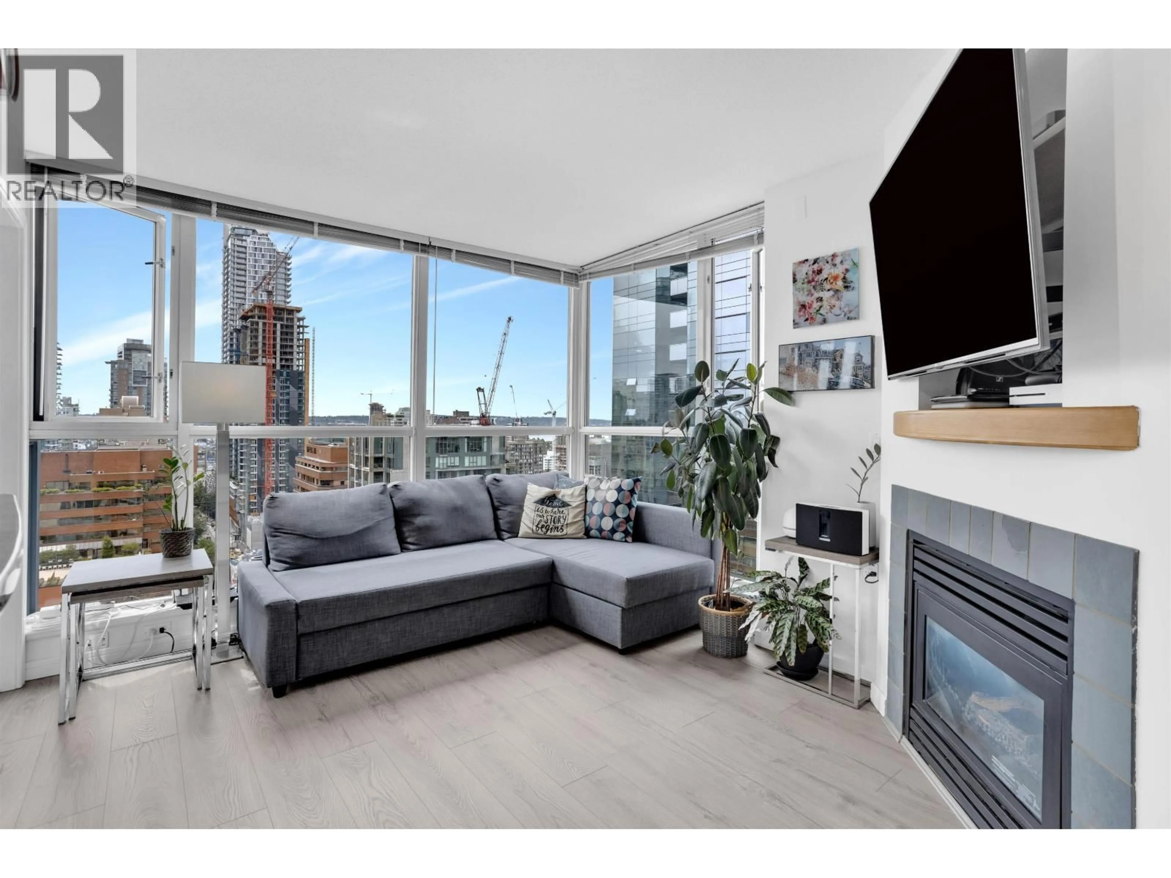 Living room with furniture, wood/laminate floor for 2507 - 1068 HORNBY STREET, Vancouver British Columbia V6Z2Y7