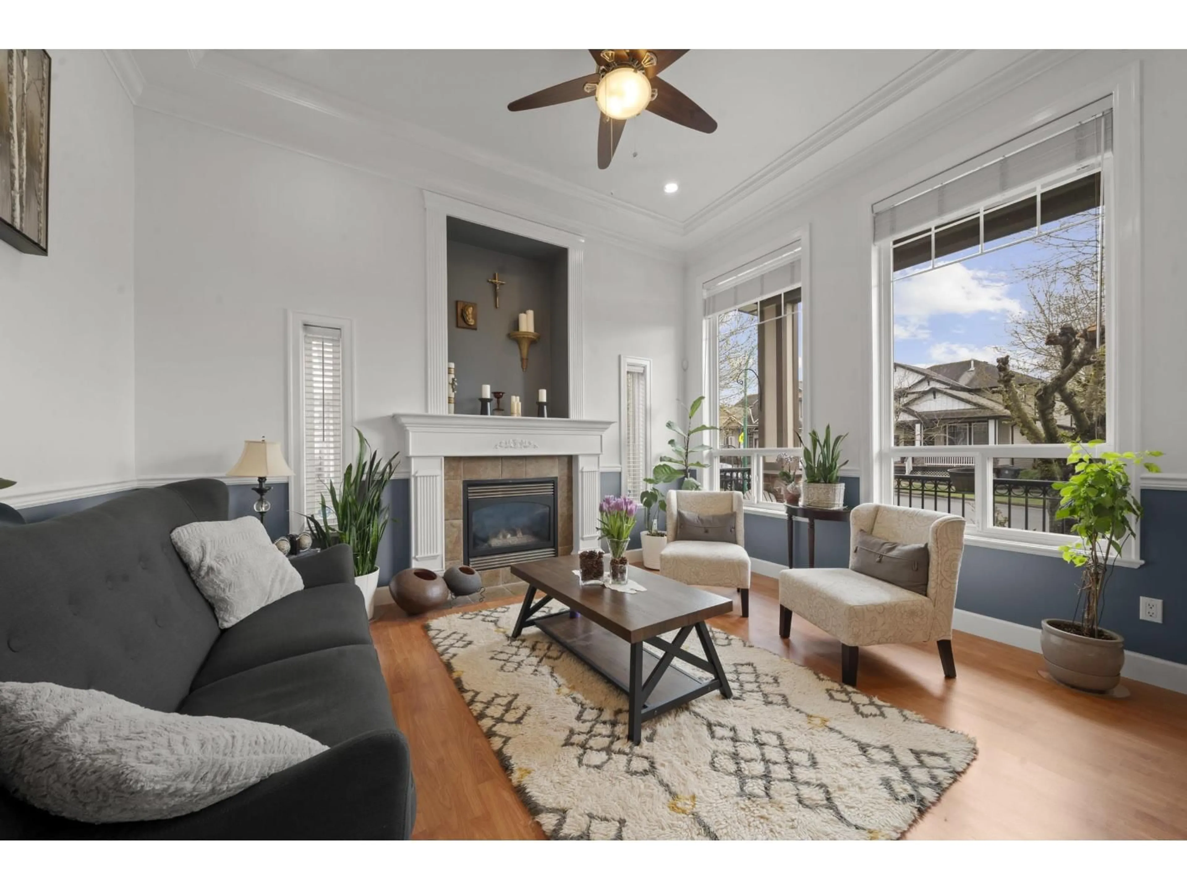 Living room with furniture, wood/laminate floor for 18973 70B AVENUE, Surrey British Columbia V4N5N9