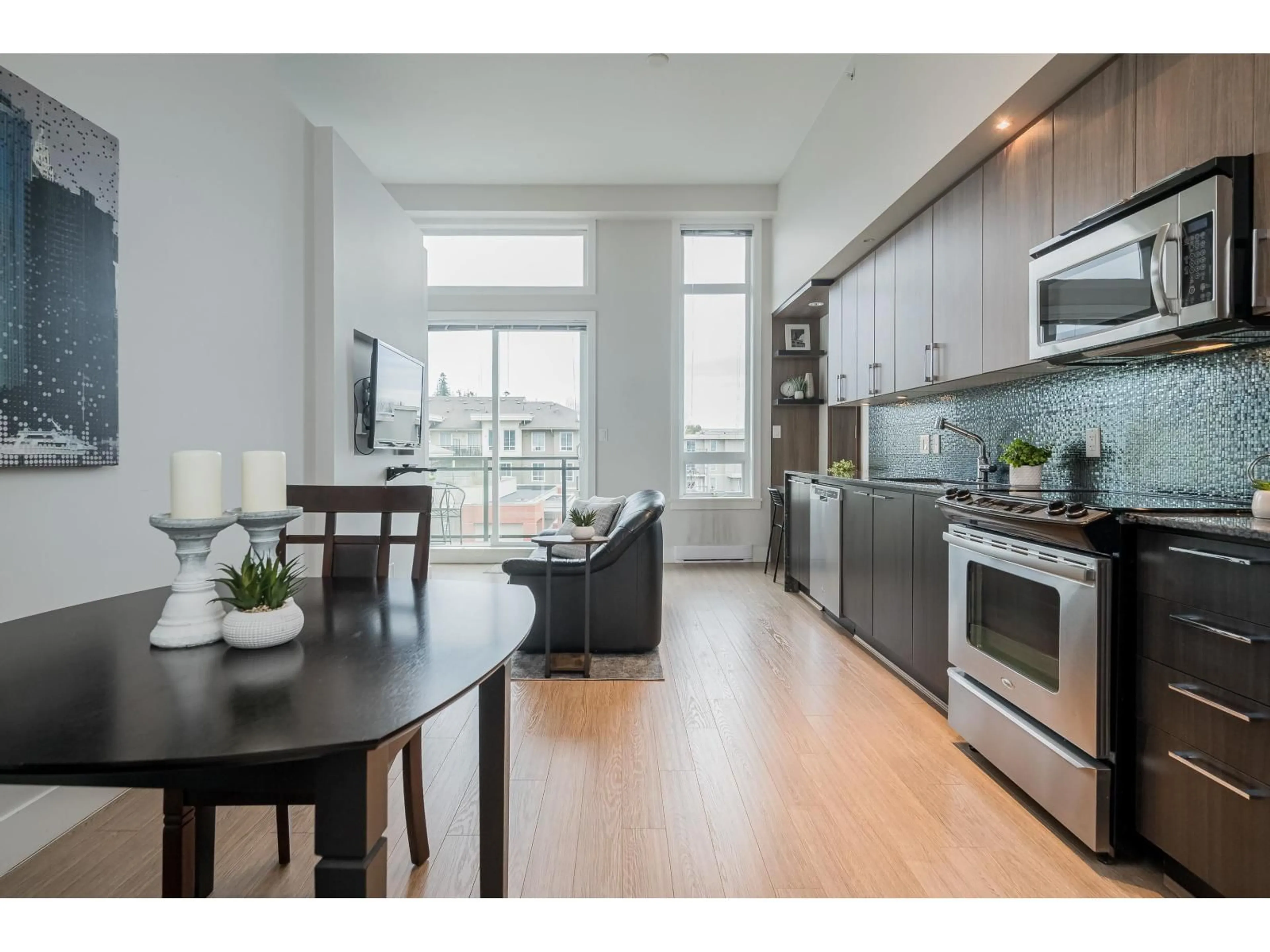 Open concept kitchen, wood/laminate floor for A401 - 20211 66 AVENUE, Langley British Columbia V2Y0L4