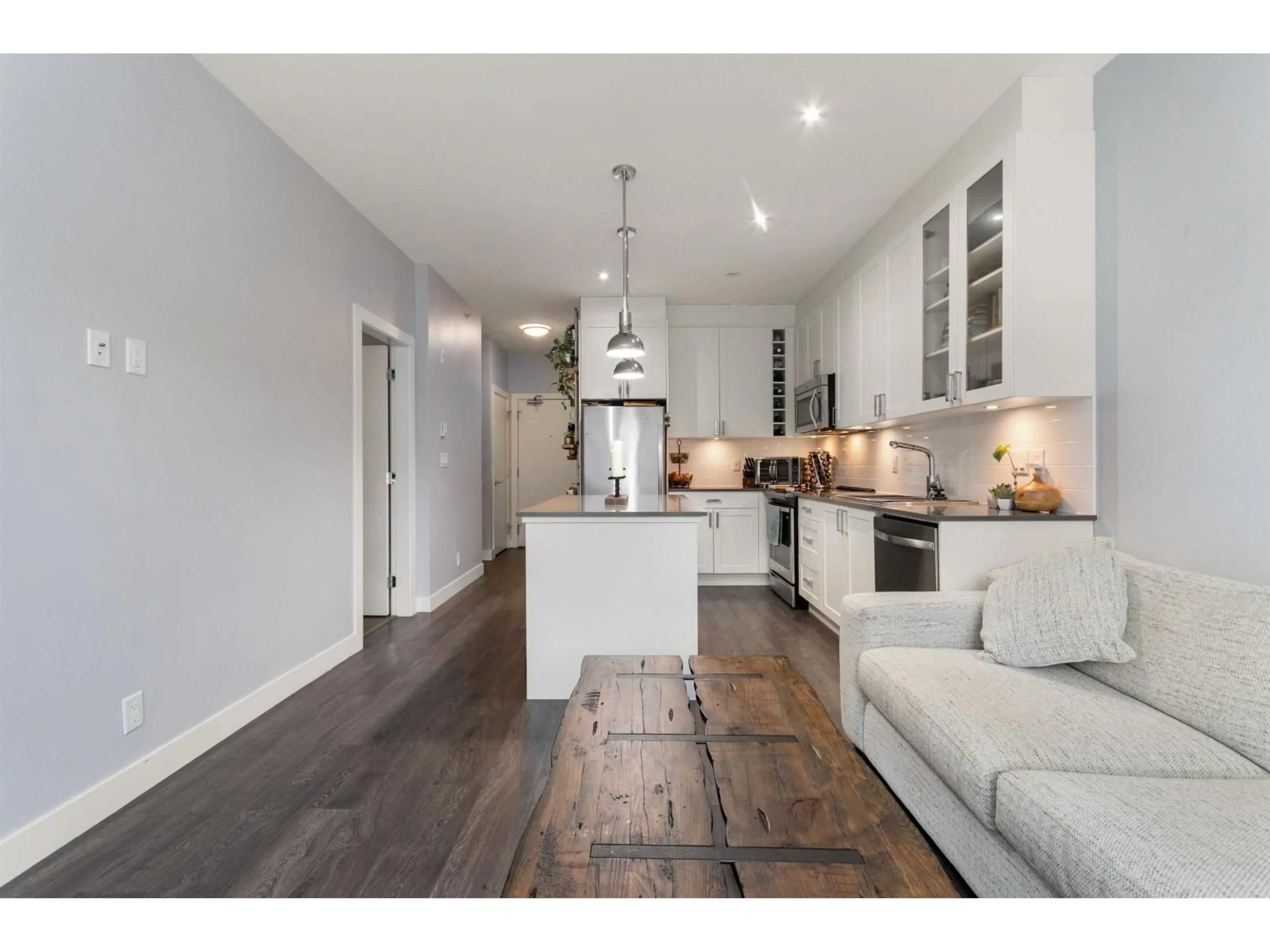 Open concept kitchen, wood/laminate floor for 408 - 16396 64 AVENUE, Surrey British Columbia V3S6X6