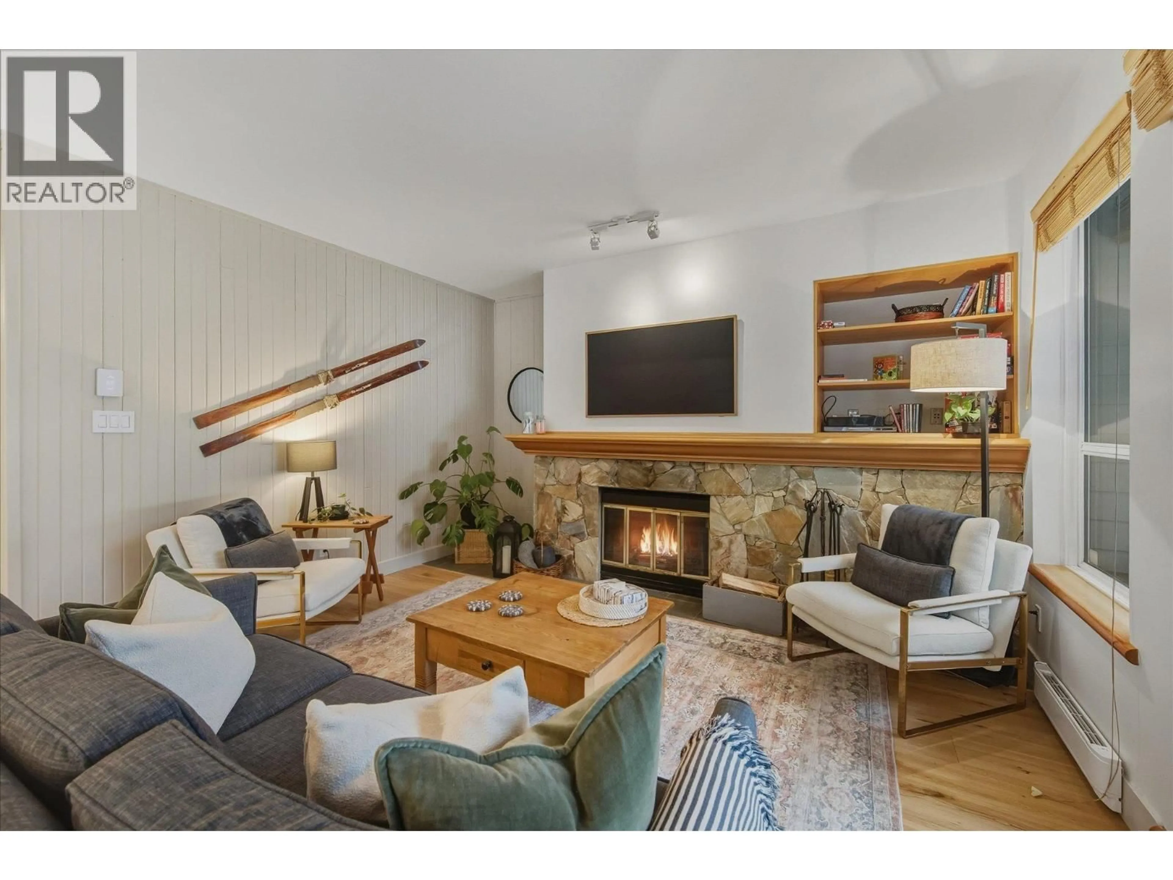 Living room with furniture, wood/laminate floor for 24 - 4628 BLACKCOMB WAY, Whistler British Columbia V0N1B4