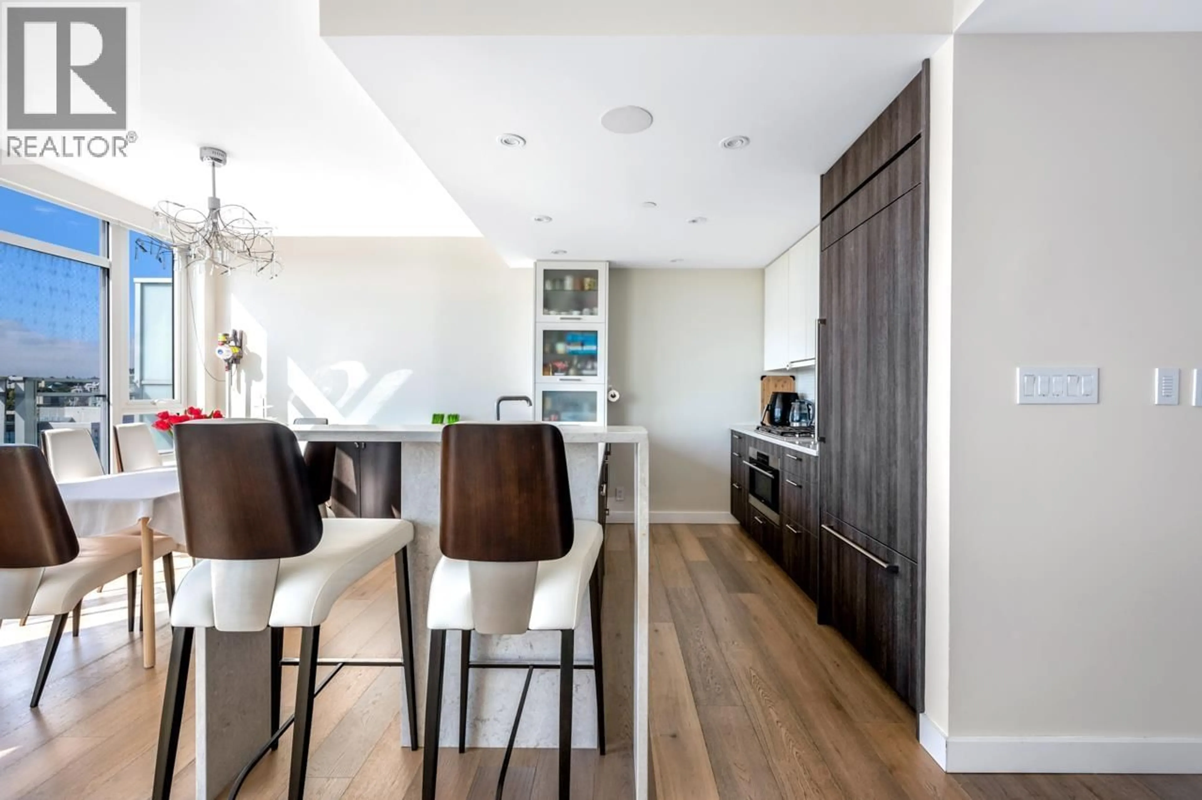 Contemporary kitchen, wood/laminate floor for 2101 - 1618 QUEBEC STREET, Vancouver British Columbia V6A0C5