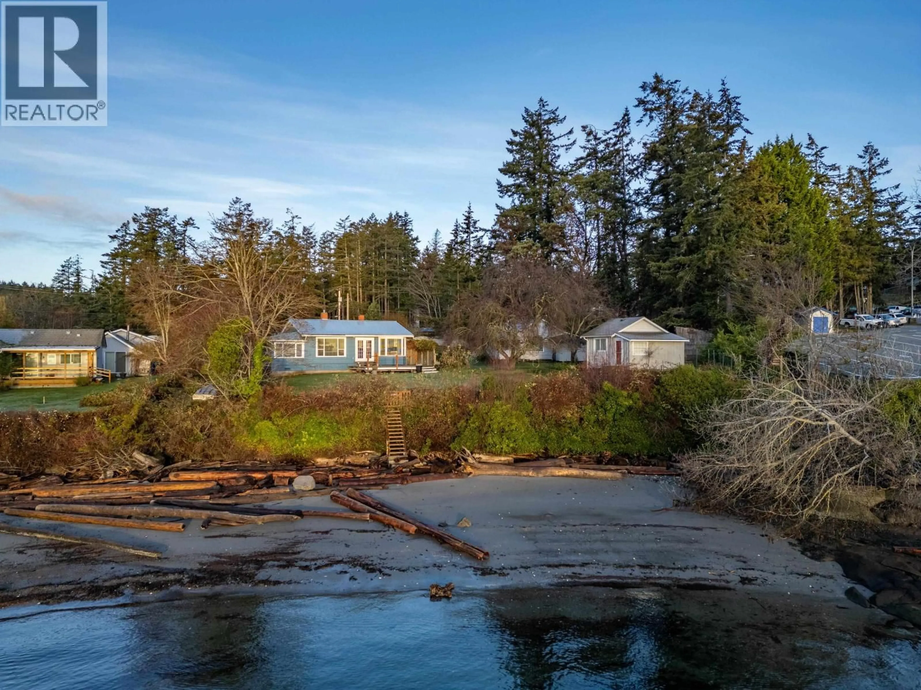 A pic from outside/outdoor area/front of a property/back of a property/a pic from drone, water/lake/river/ocean view for 73 MADRONA ROAD, Galiano Island British Columbia V0N1P0