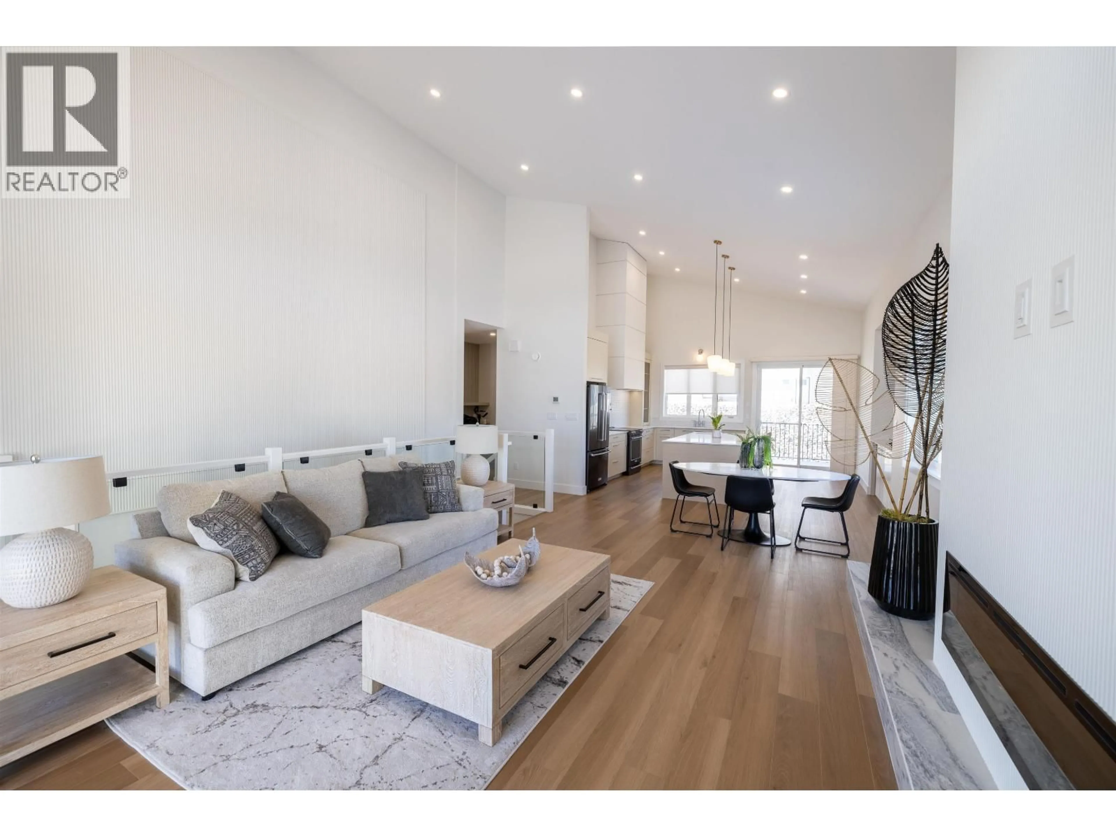 Living room with furniture, wood/laminate floor for 7807 SOUTHRIDGE AVENUE, Prince George British Columbia V2N6S4