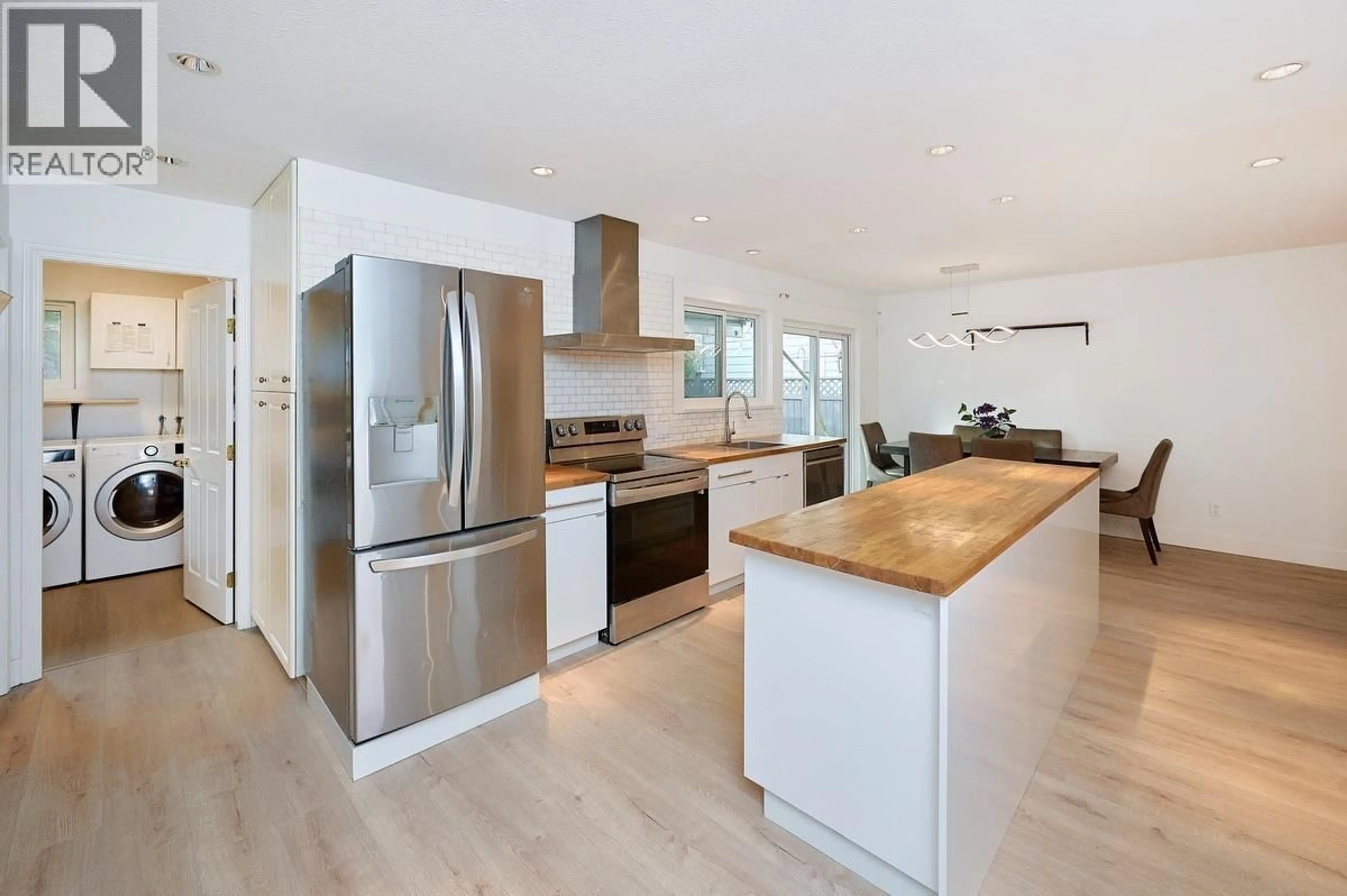 Open concept kitchen, wood/laminate floor for 3256 DUNKIRK AVENUE, Coquitlam British Columbia V3E1G4