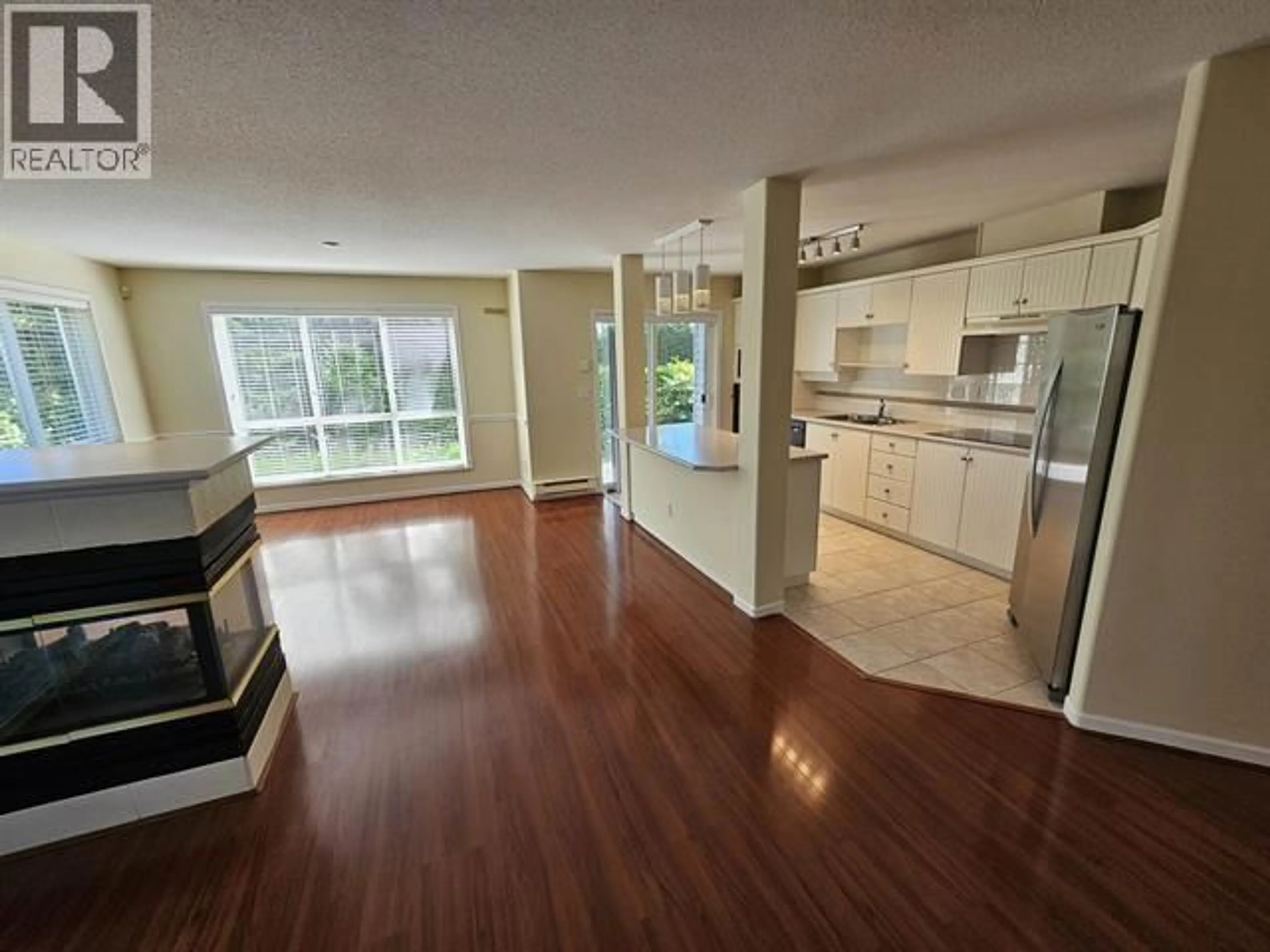 Open concept kitchen, unknown for 107 - 12633 NO. 2 ROAD, Richmond British Columbia V7E6N5