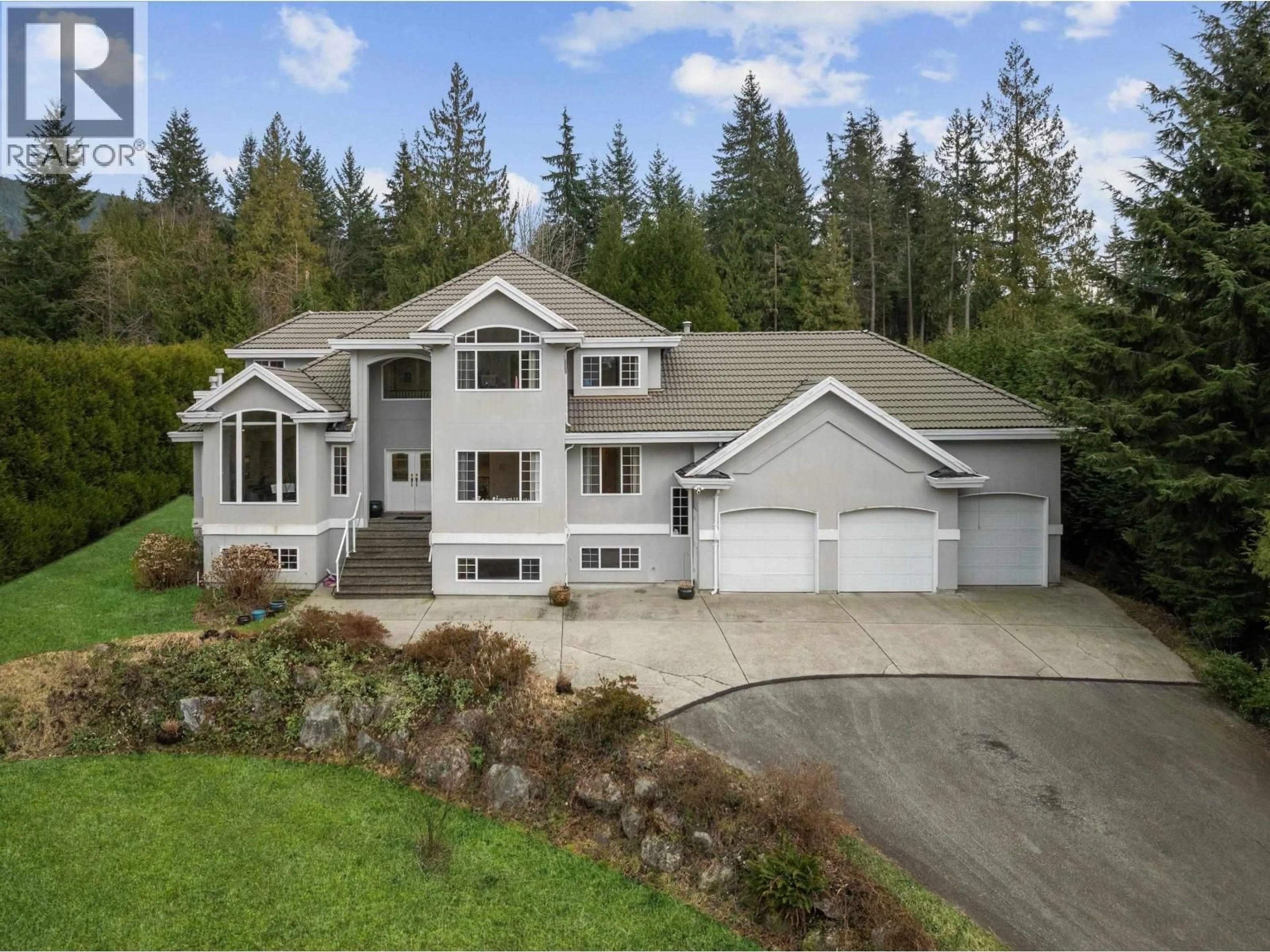A pic from outside/outdoor area/front of a property/back of a property/a pic from drone, unknown for 220 FERN DRIVE, Anmore British Columbia V3H4W9