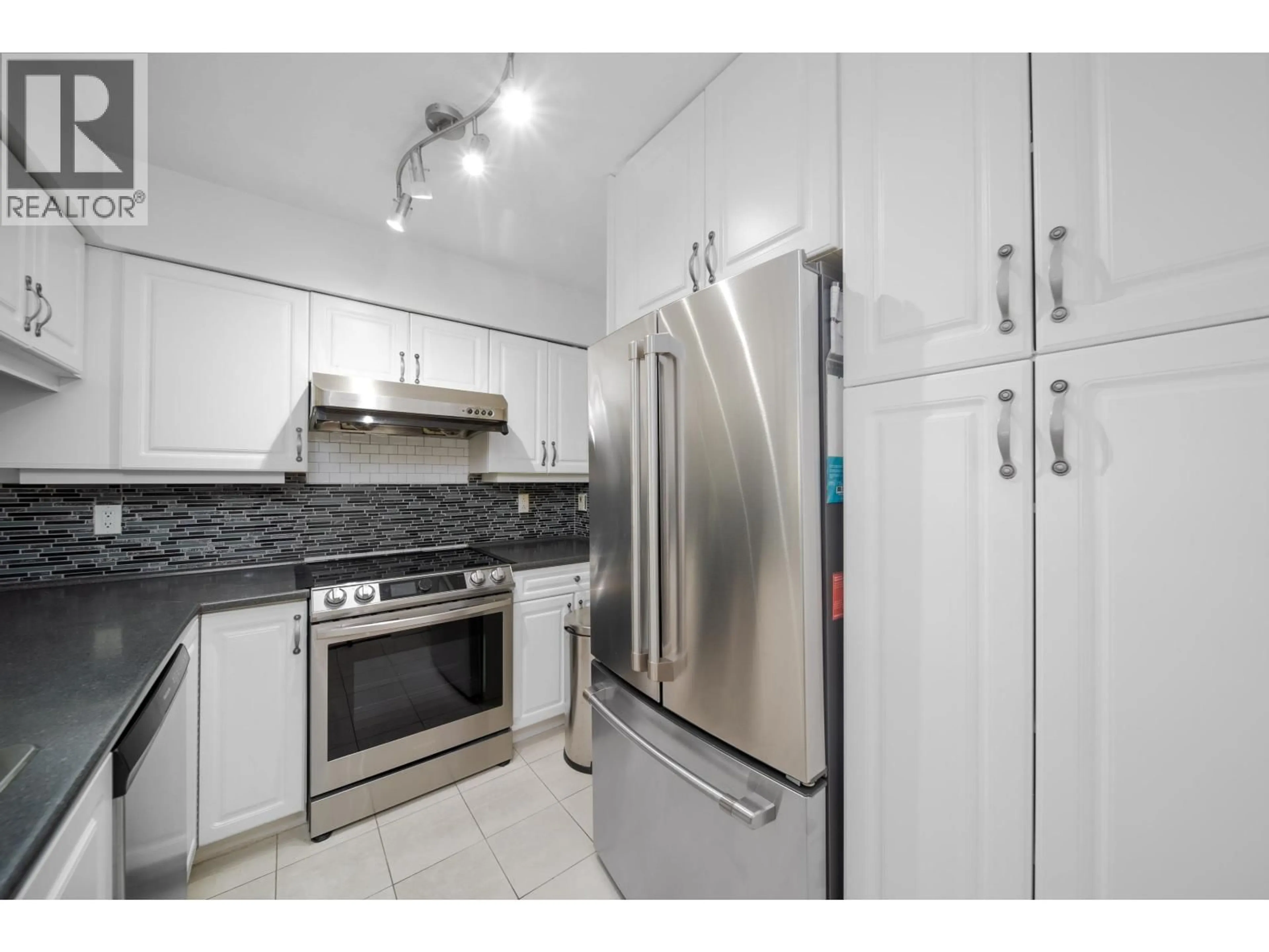 Standard kitchen, ceramic/tile floor for 302 - 8728 MARINE DRIVE, Vancouver British Columbia V6P6A4