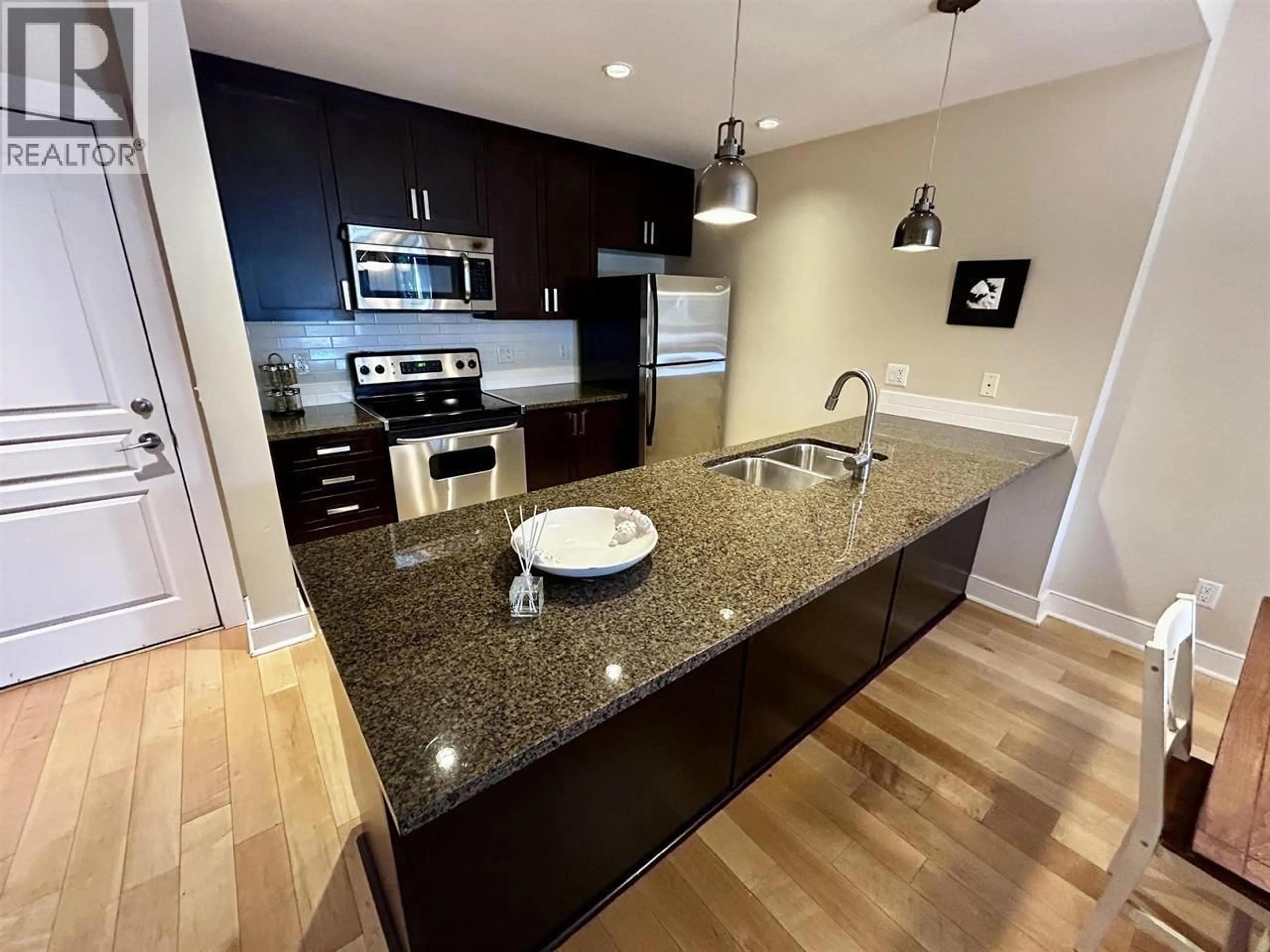 Open concept kitchen, unknown for 405 - 5599 14B AVENUE, Delta British Columbia V4M0A3