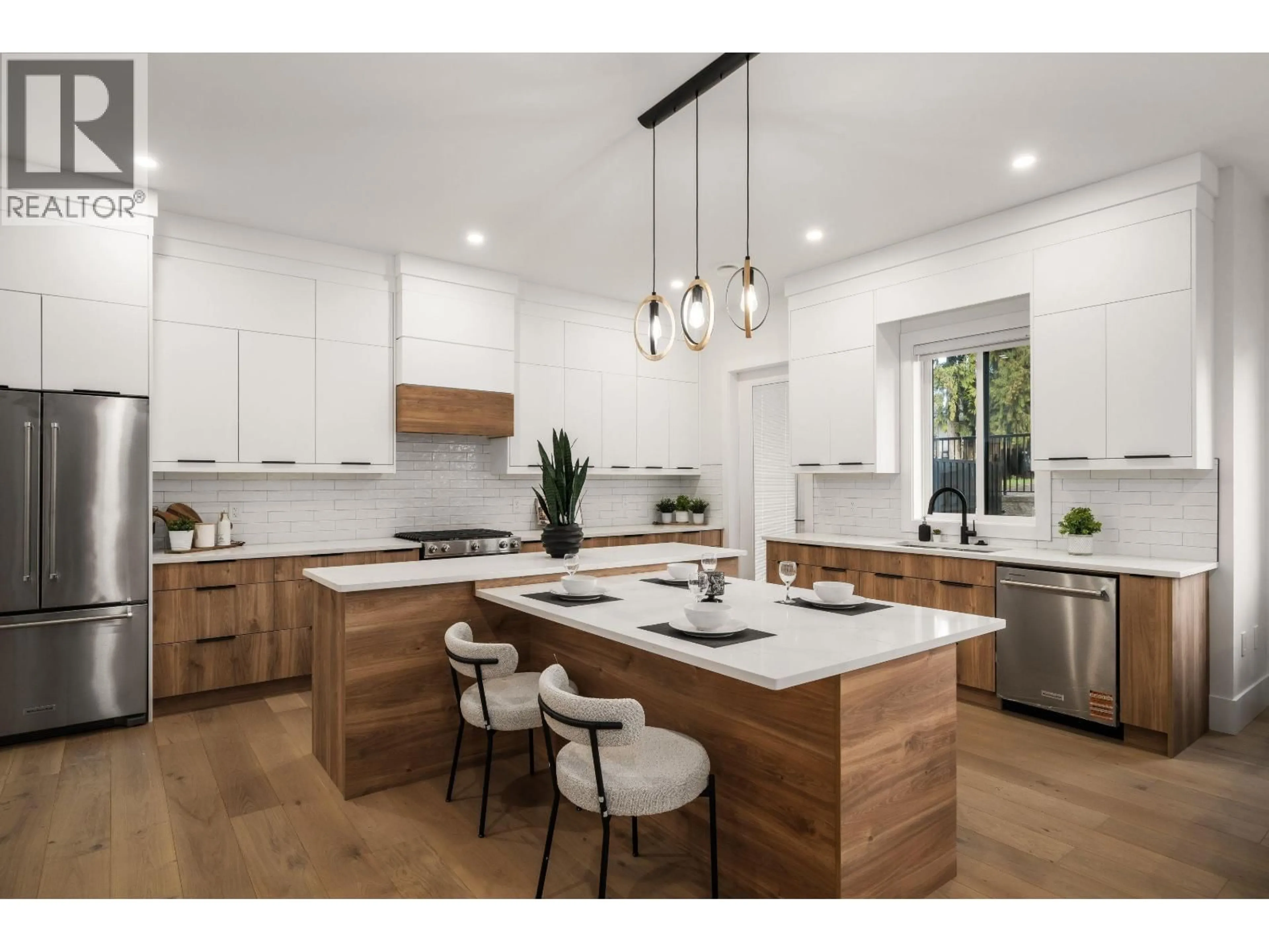 Open concept kitchen, wood/laminate floor for 104 - 941 DANSEY AVENUE, Coquitlam British Columbia V3K3G8