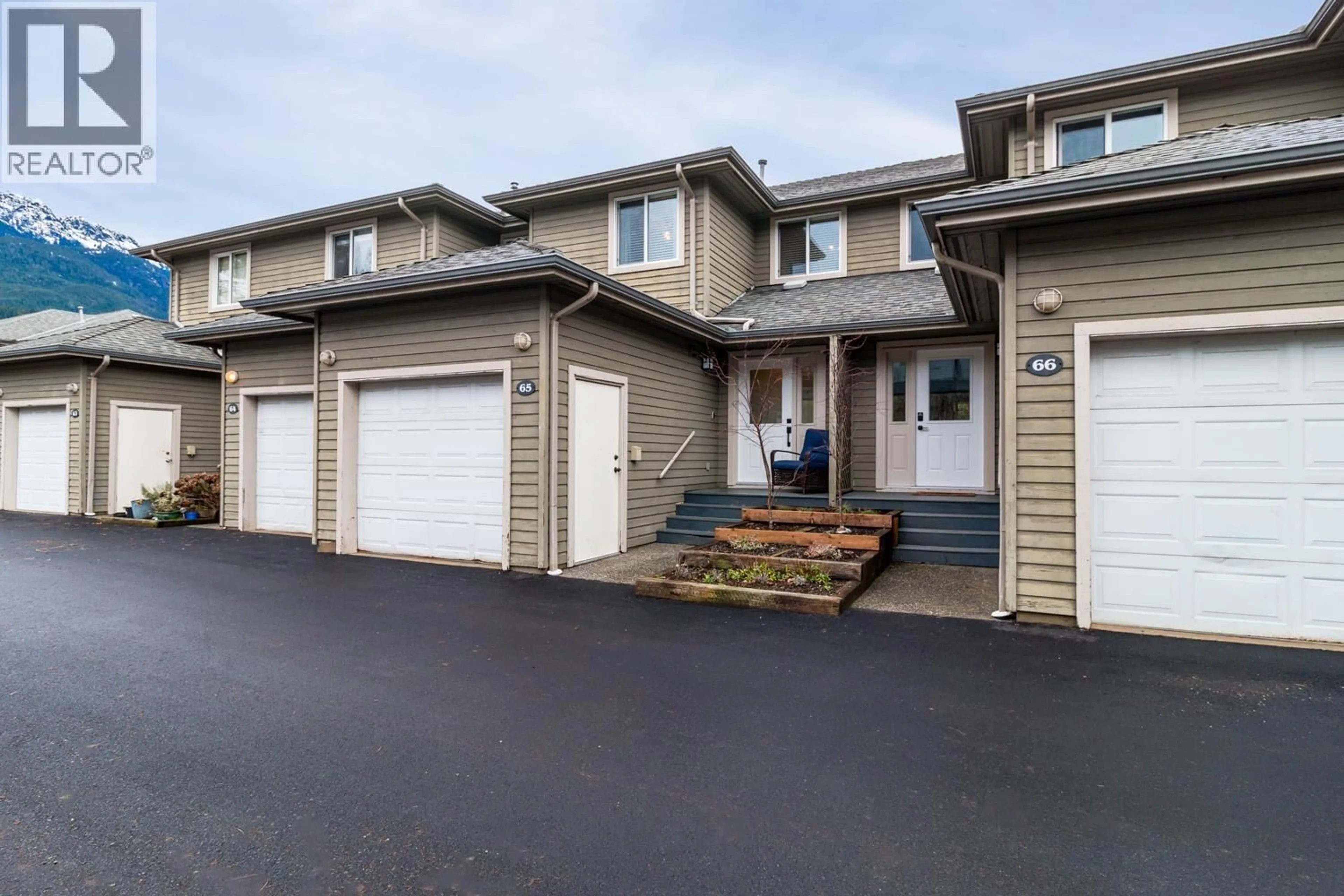 A pic from outside/outdoor area/front of a property/back of a property/a pic from drone, street for 65 - 40200 GOVERNMENT ROAD, Squamish British Columbia V8B0G6