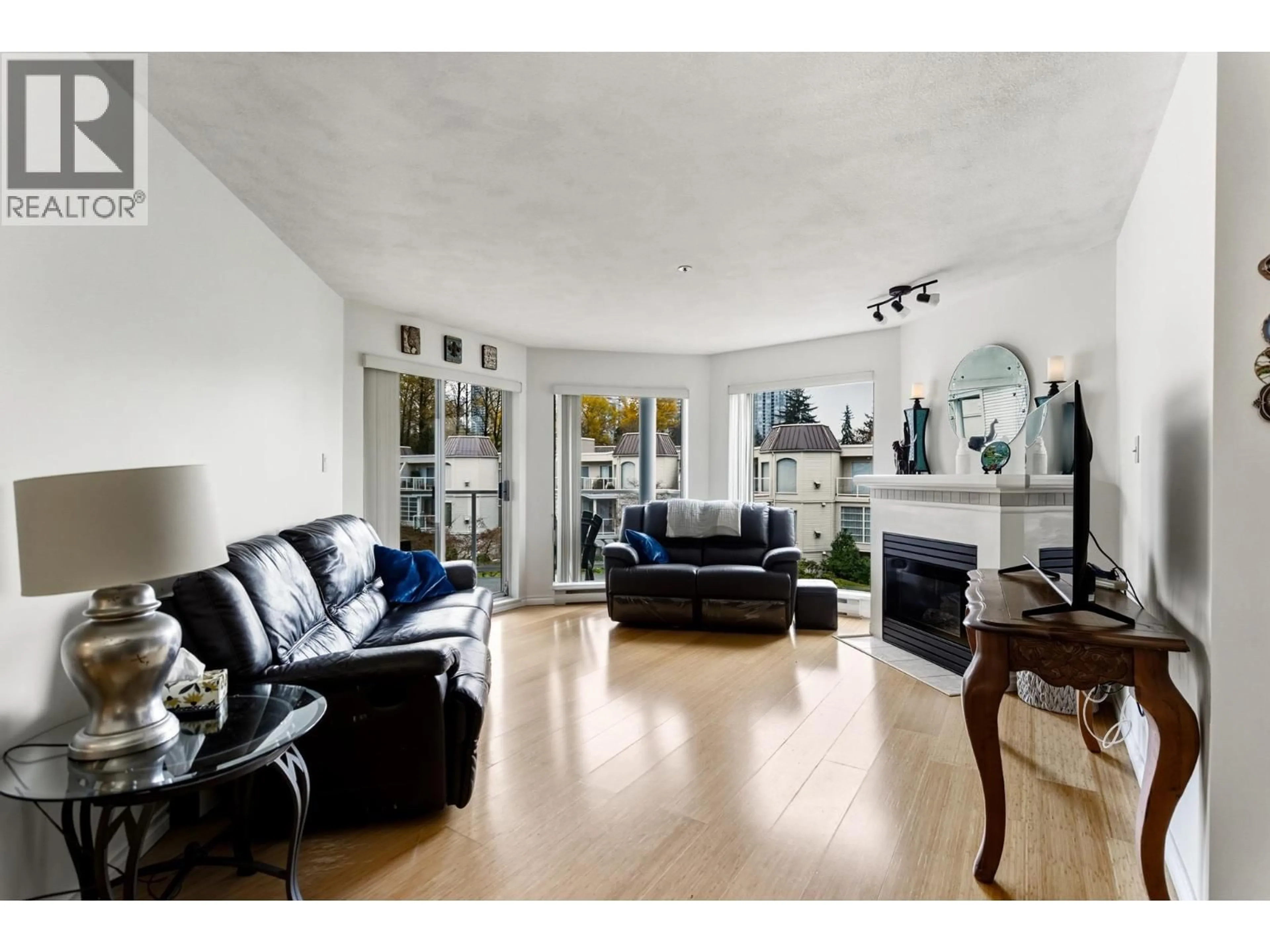 Living room with furniture, unknown for 320 - 1220 LASALLE PLACE, Coquitlam British Columbia V3B7L6