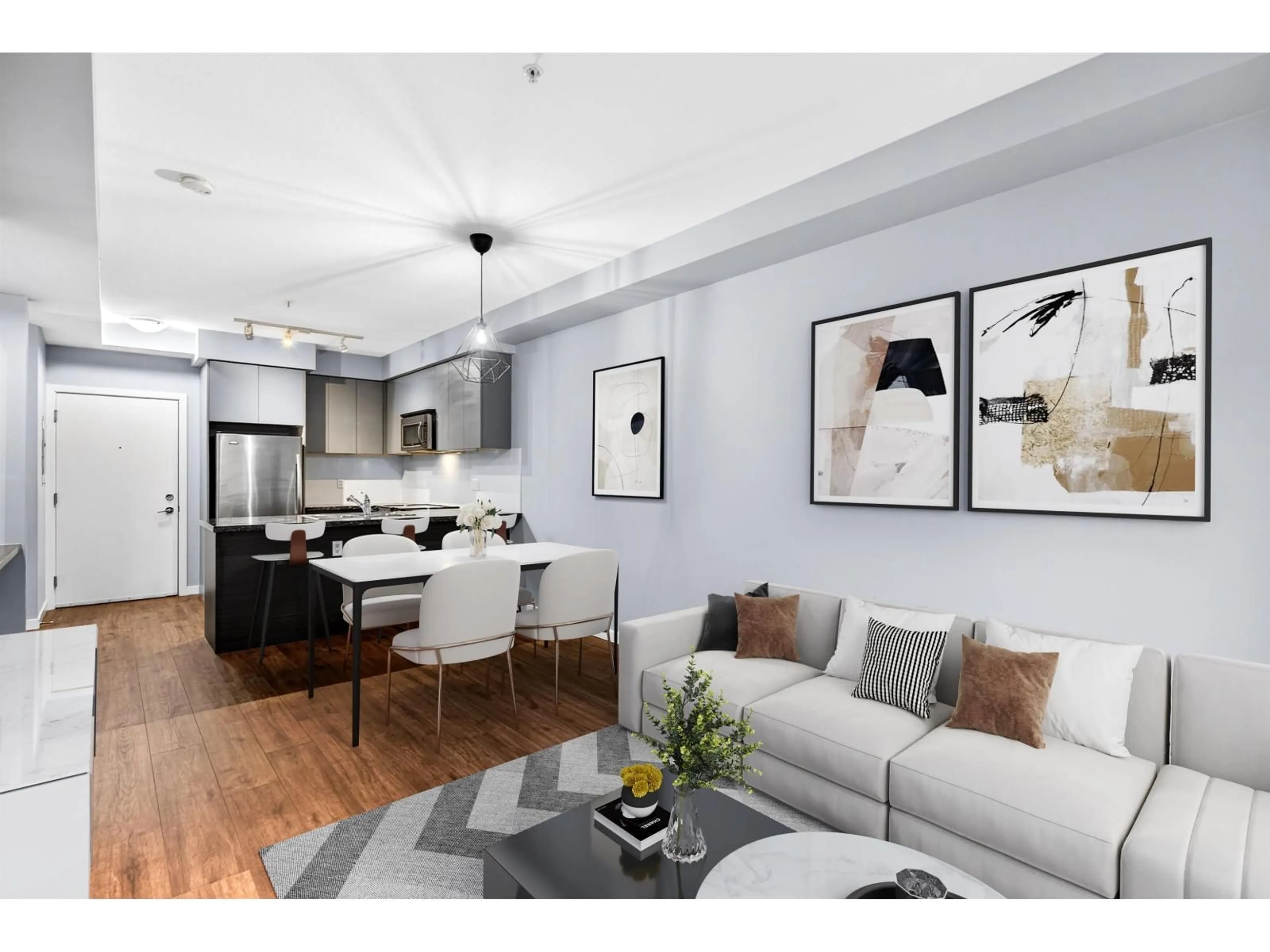 Living room with furniture, wood/laminate floor for 211 - 6420 194 STREET, Surrey British Columbia V4N6J7