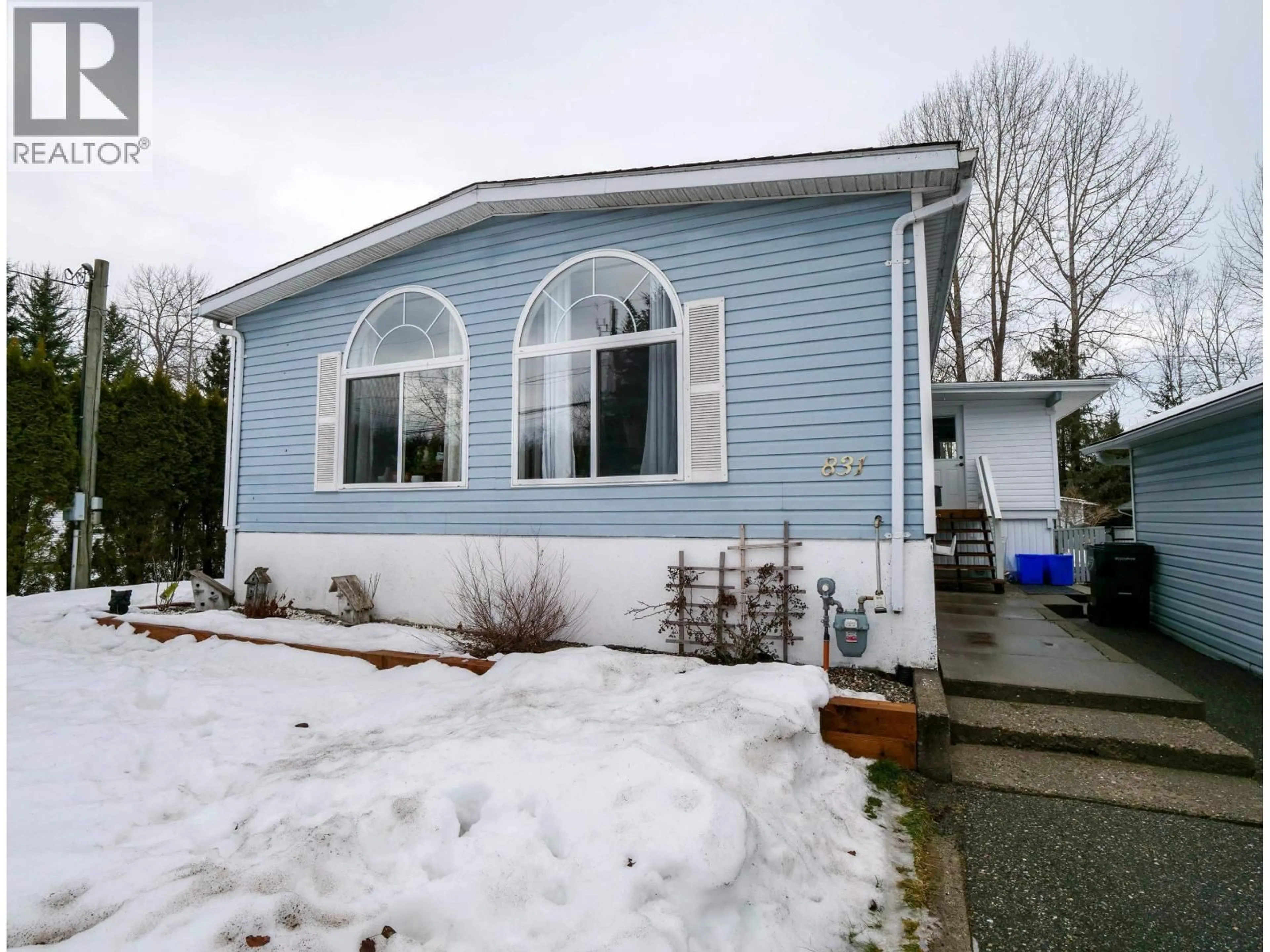 Home with vinyl exterior material, street for 831 KUBE STREET, Quesnel British Columbia V2J5P9