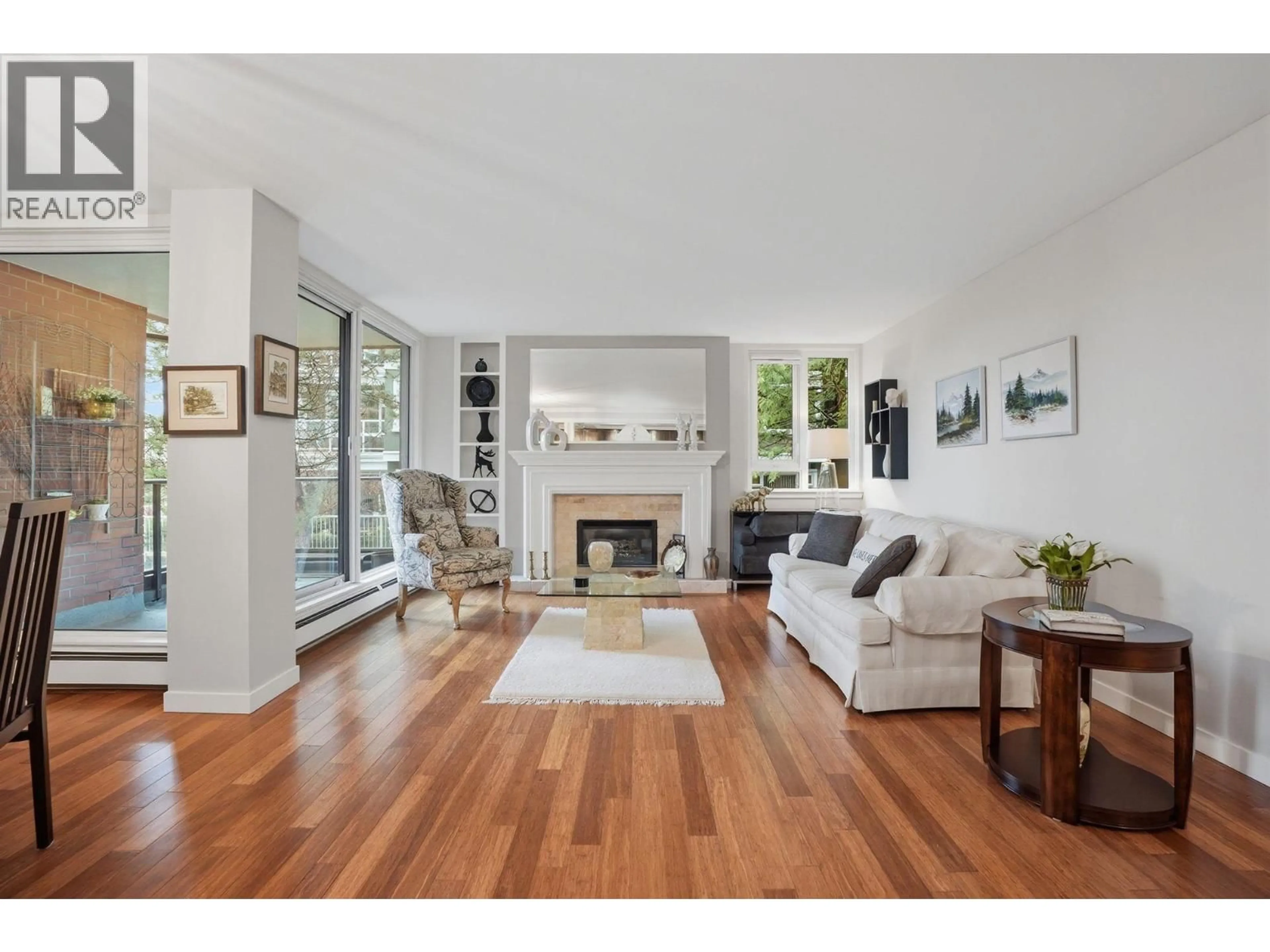 Living room with furniture, wood/laminate floor for 304 - 1350 VIEW CRESCENT, Delta British Columbia V4L2K3