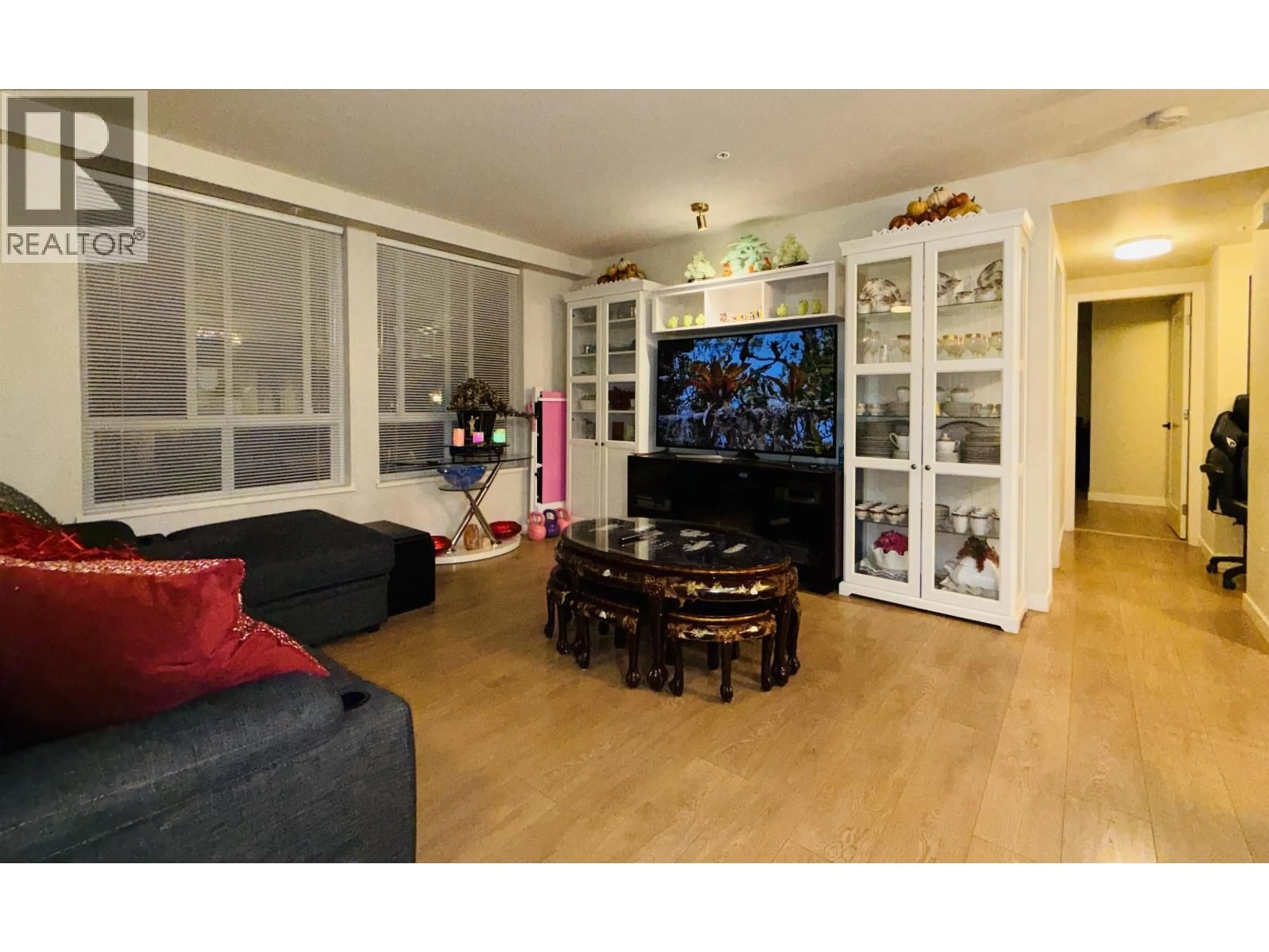 Living room with furniture, wood/laminate floor for 49 - 3728 THURSTON STREET, Burnaby British Columbia V5H0E6