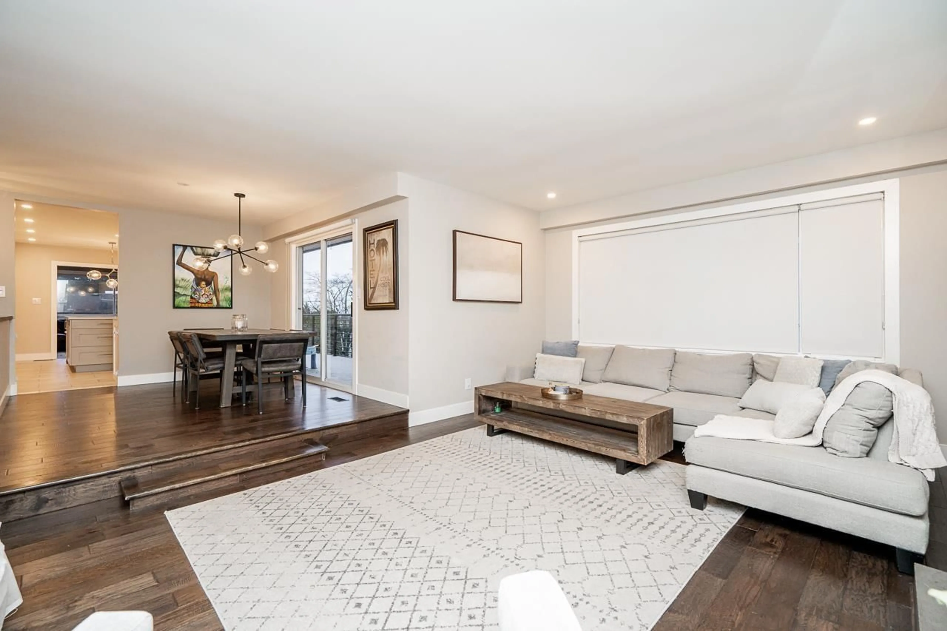 Living room with furniture, wood/laminate floor for 8024 WILTHSHIRE BOULEVARD, Delta British Columbia V4C4B6