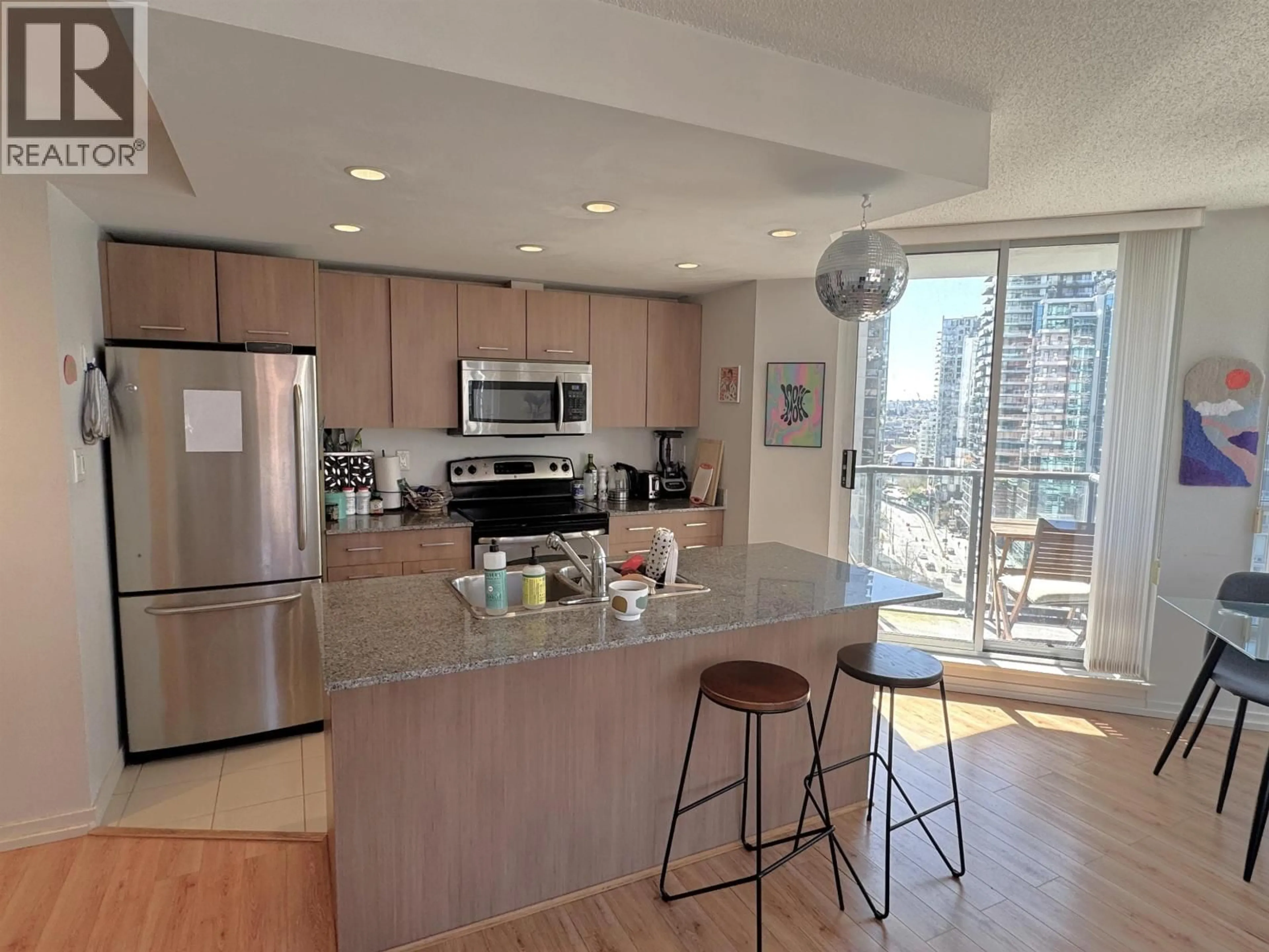 Open concept kitchen, unknown for 1504 - 1212 HOWE STREET, Vancouver British Columbia V6Z2M9