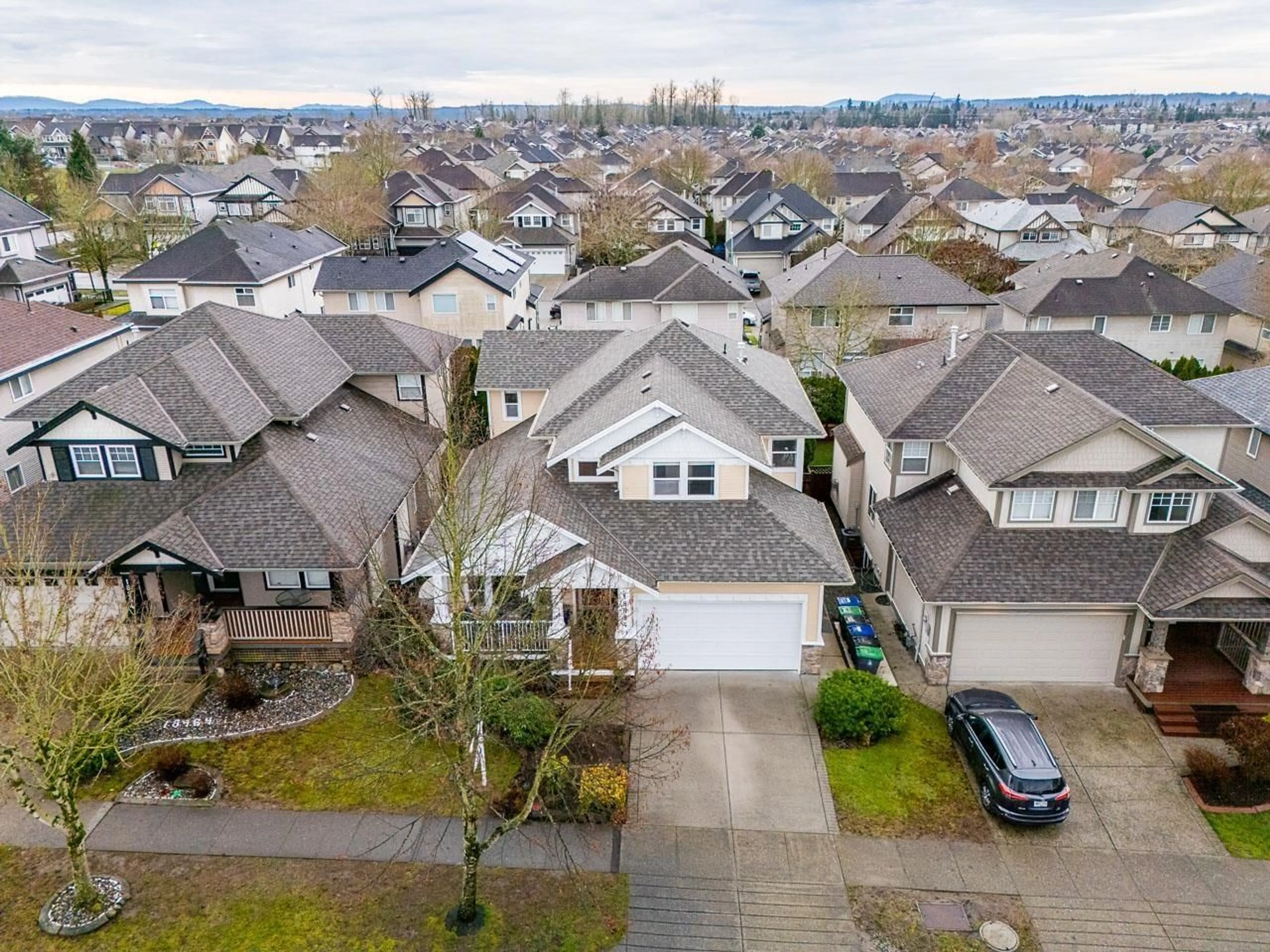 A pic from outside/outdoor area/front of a property/back of a property/a pic from drone, street for 18954 71 AVENUE, Surrey British Columbia V4N5M7
