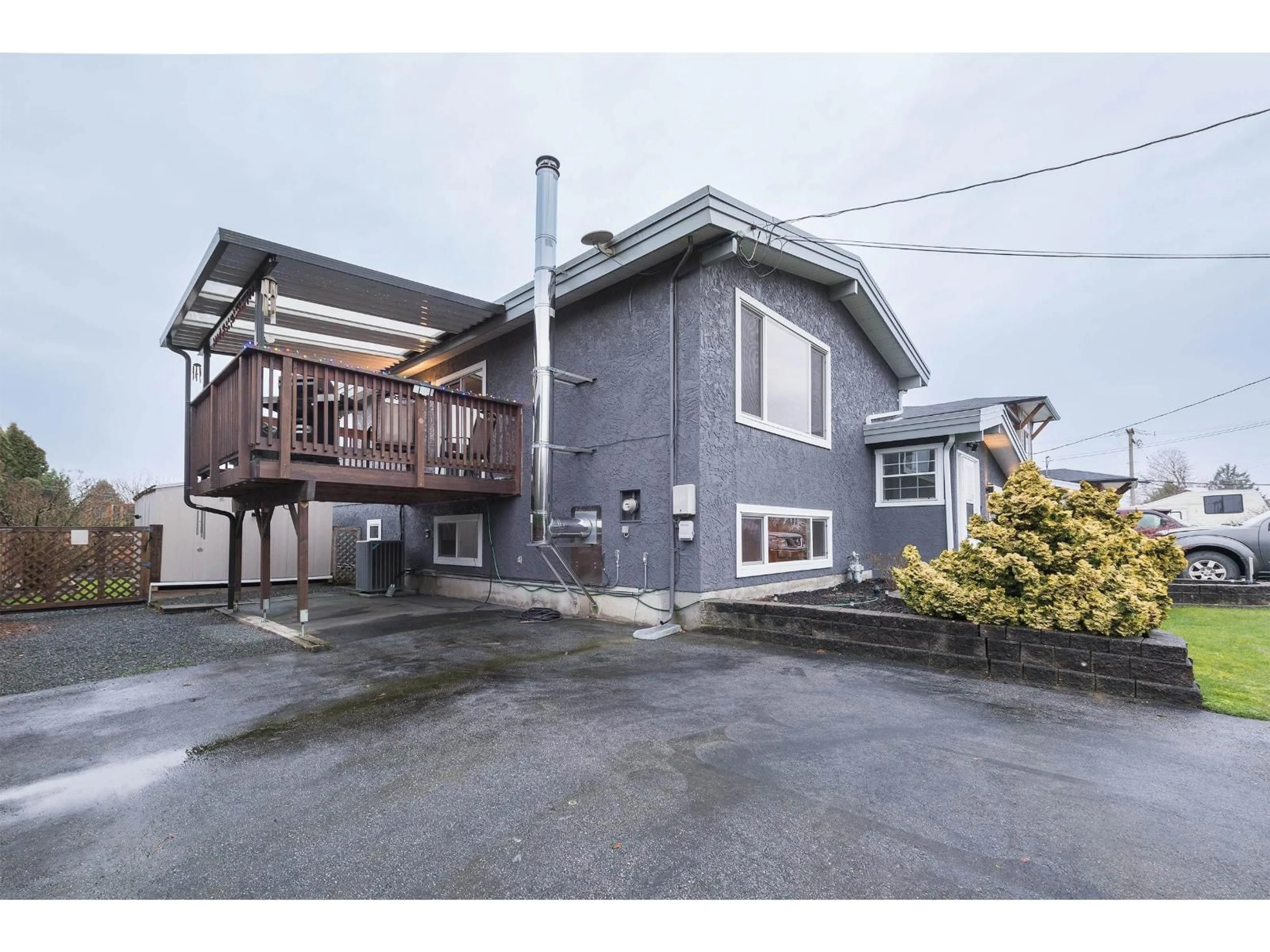 A pic from outside/outdoor area/front of a property/back of a property/a pic from drone, street for 10283 KENT ROAD, Chilliwack British Columbia V2P5X8