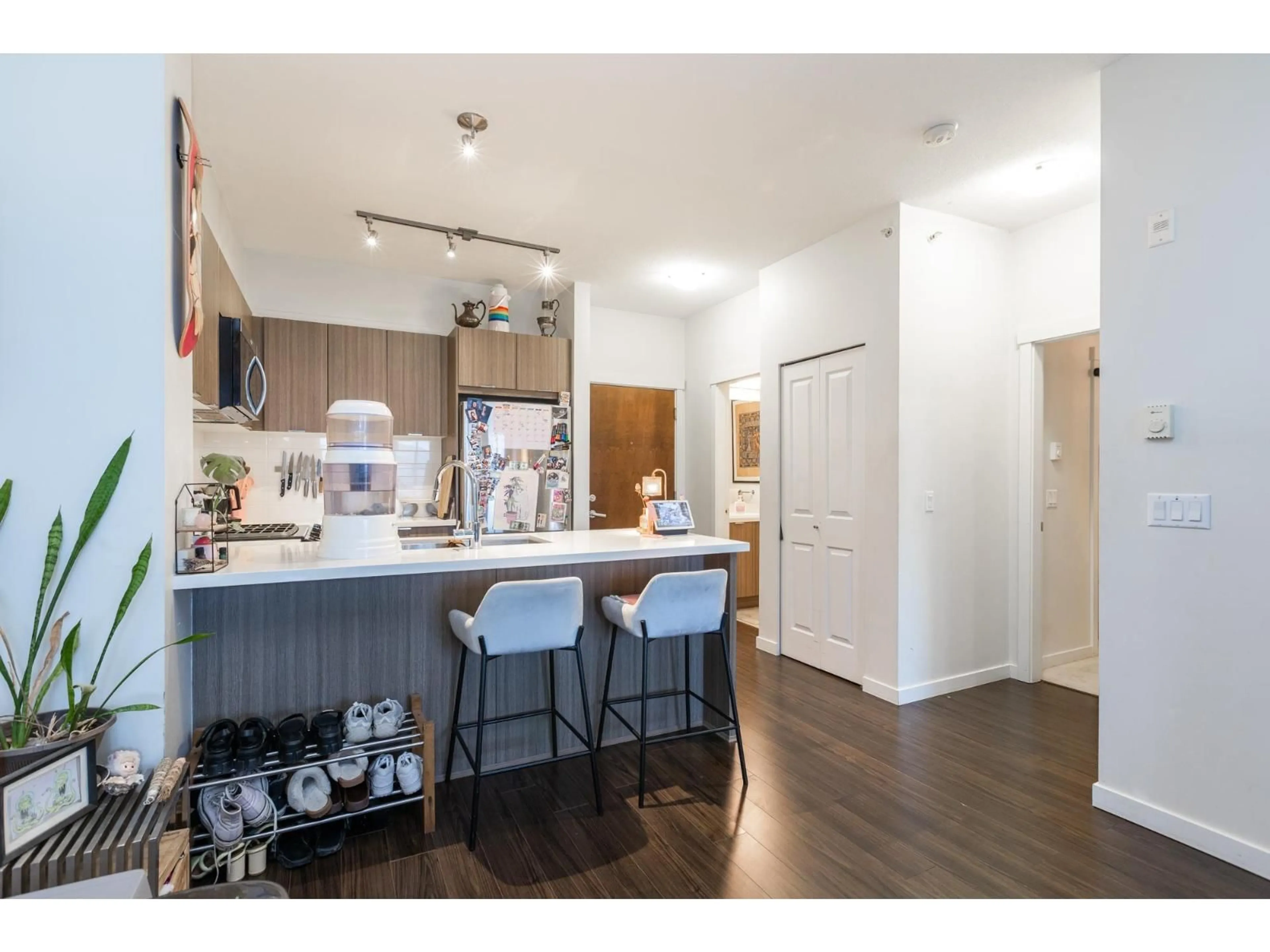 Open concept kitchen, wood/laminate floor for 413 - 3323 151 STREET, Surrey British Columbia V3Z0L3
