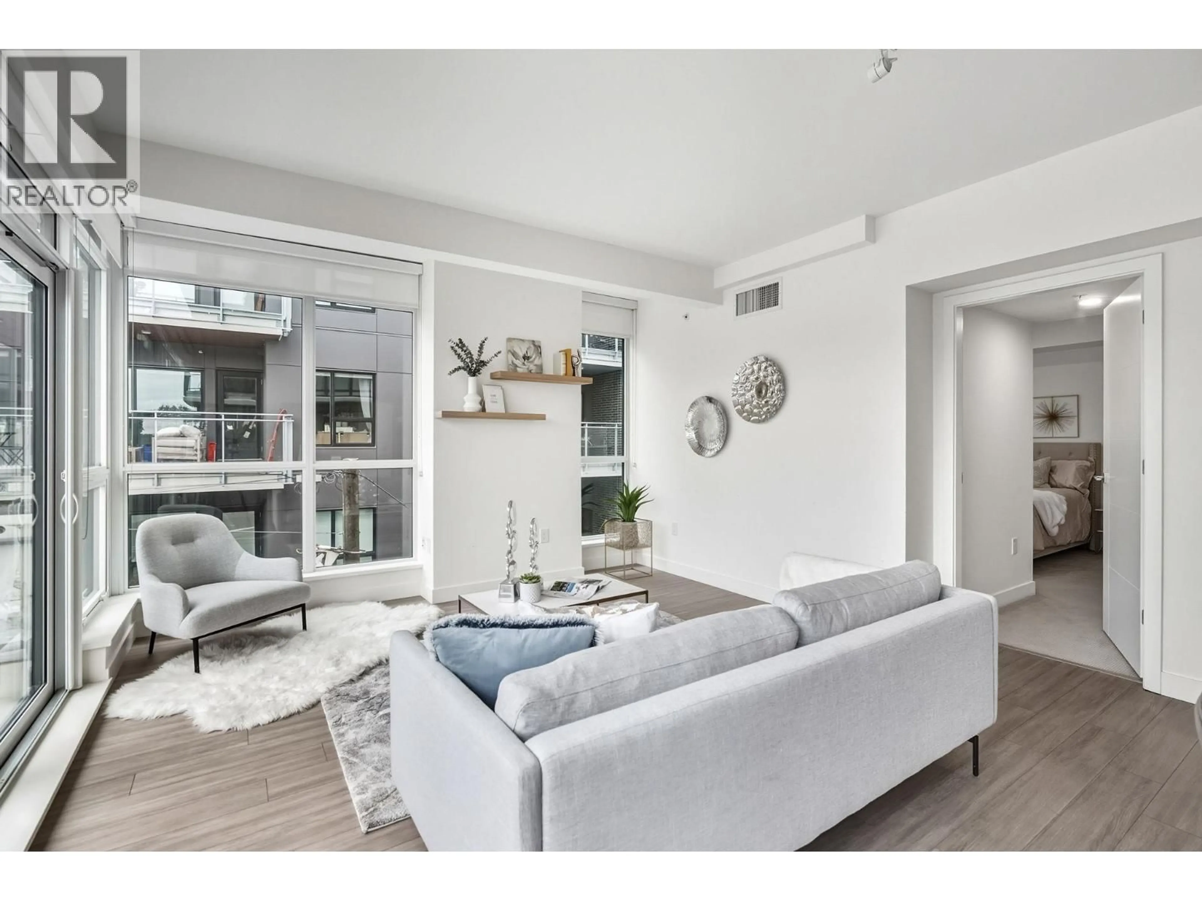 Living room with furniture, unknown for 372 - 438 KING EDWARD AVENUE, Vancouver British Columbia V5Y0M5