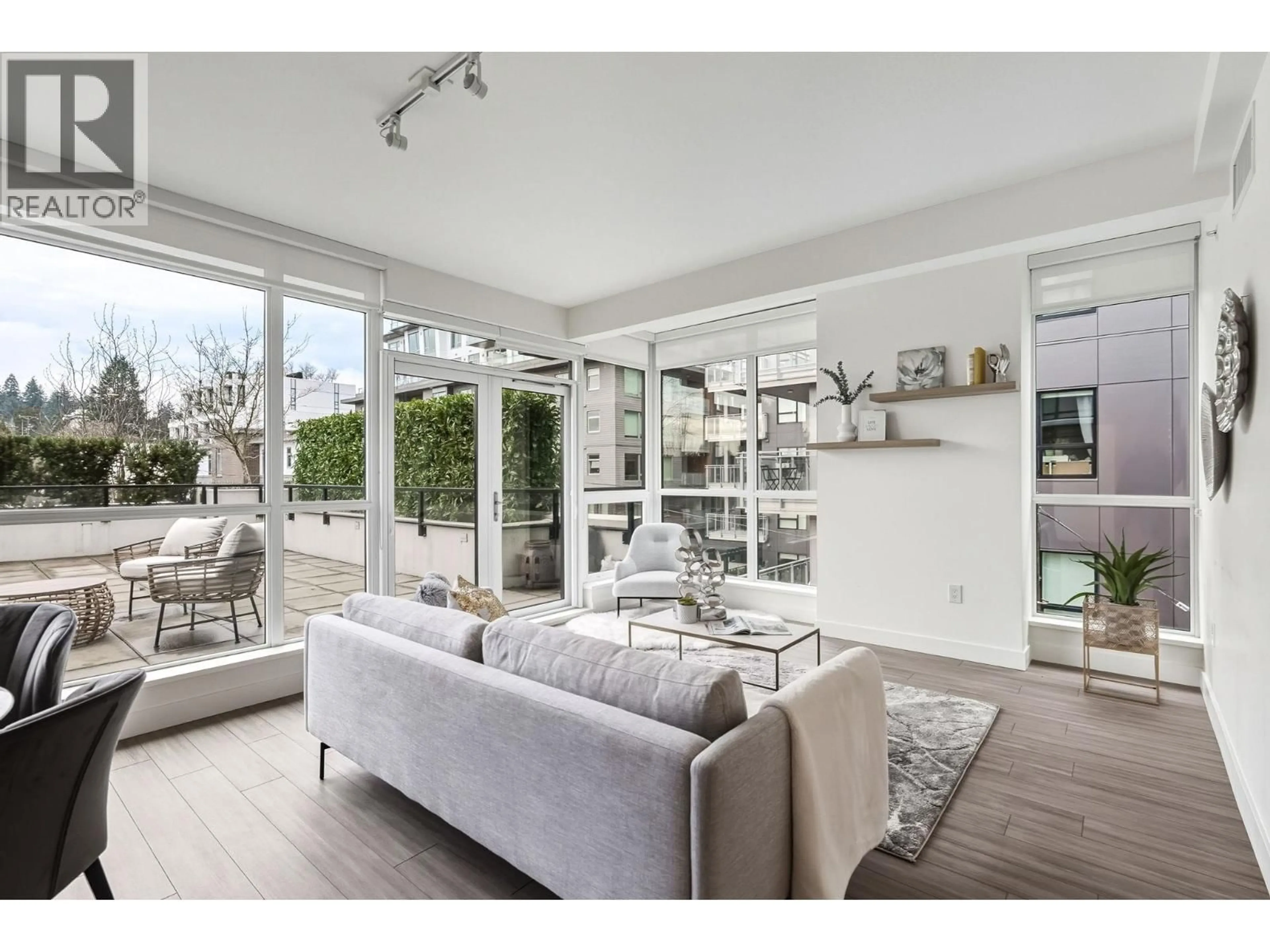 Living room with furniture, unknown for 372 - 438 KING EDWARD AVENUE, Vancouver British Columbia V5Y0M5