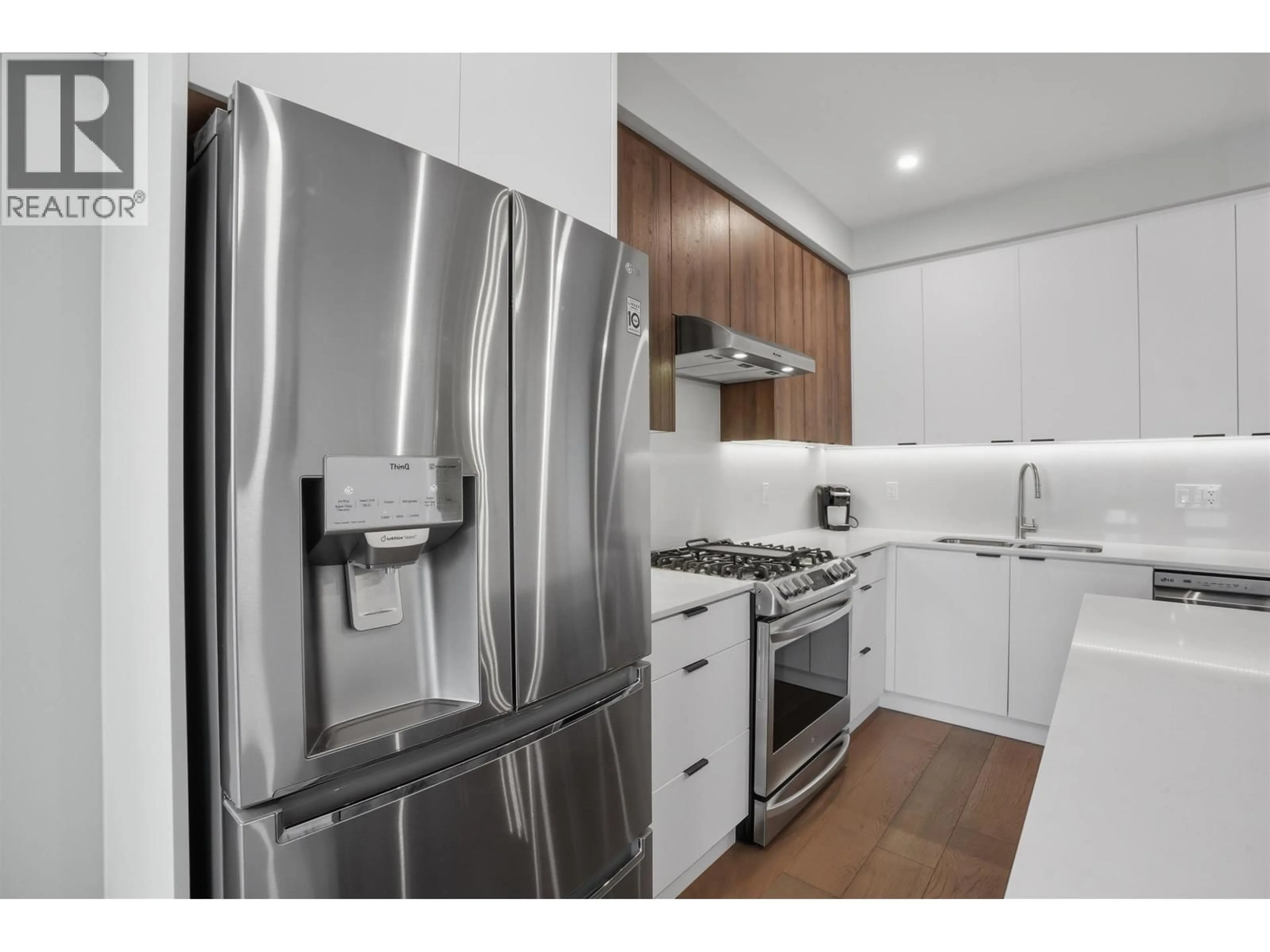 Standard kitchen, wood/laminate floor for 301 - 4686 51 STREET, Delta British Columbia V4K0E5