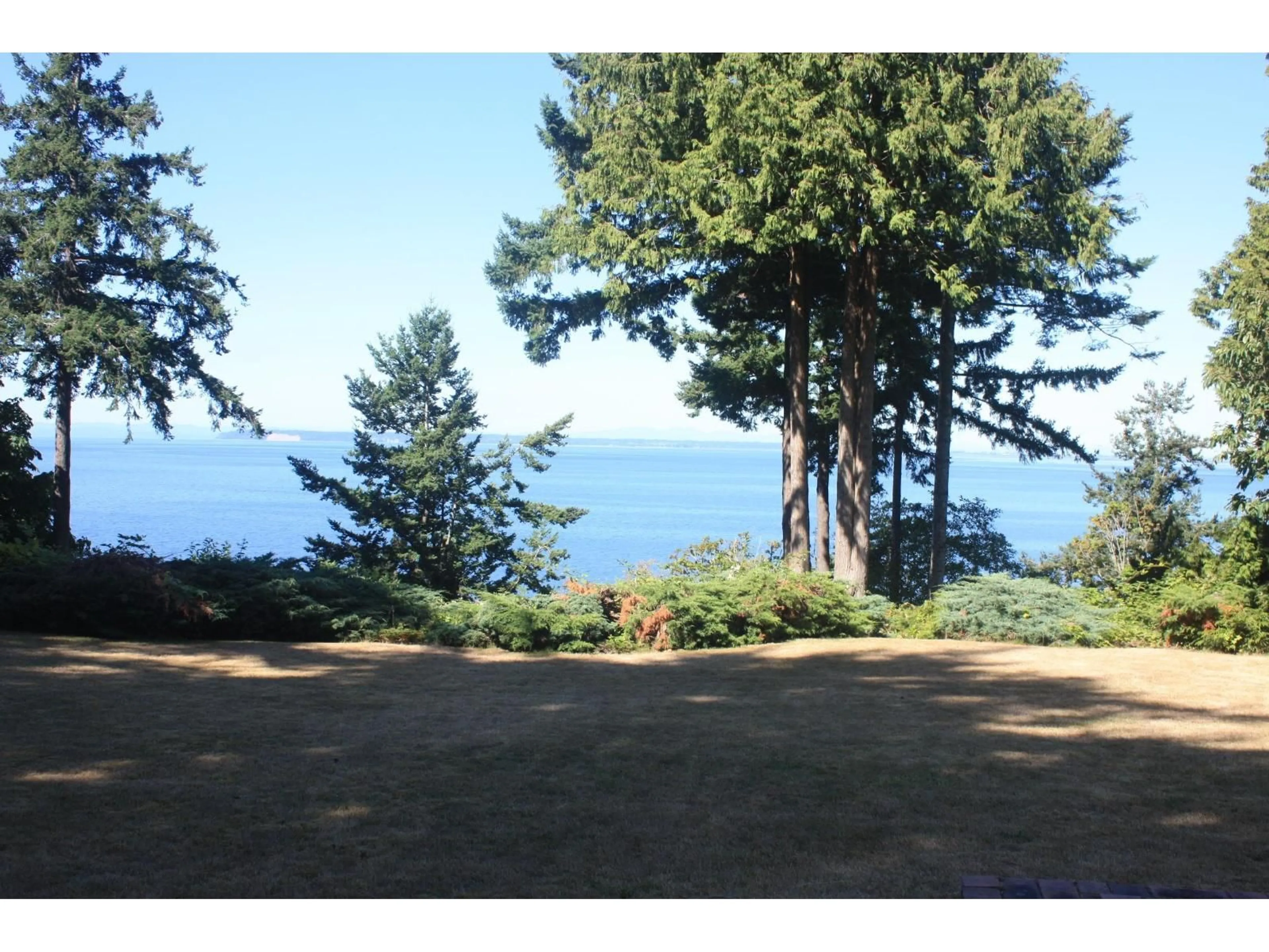 A pic from outside/outdoor area/front of a property/back of a property/a pic from drone, water/lake/river/ocean view for 12581 16 AVENUE, Surrey British Columbia V4A1M7