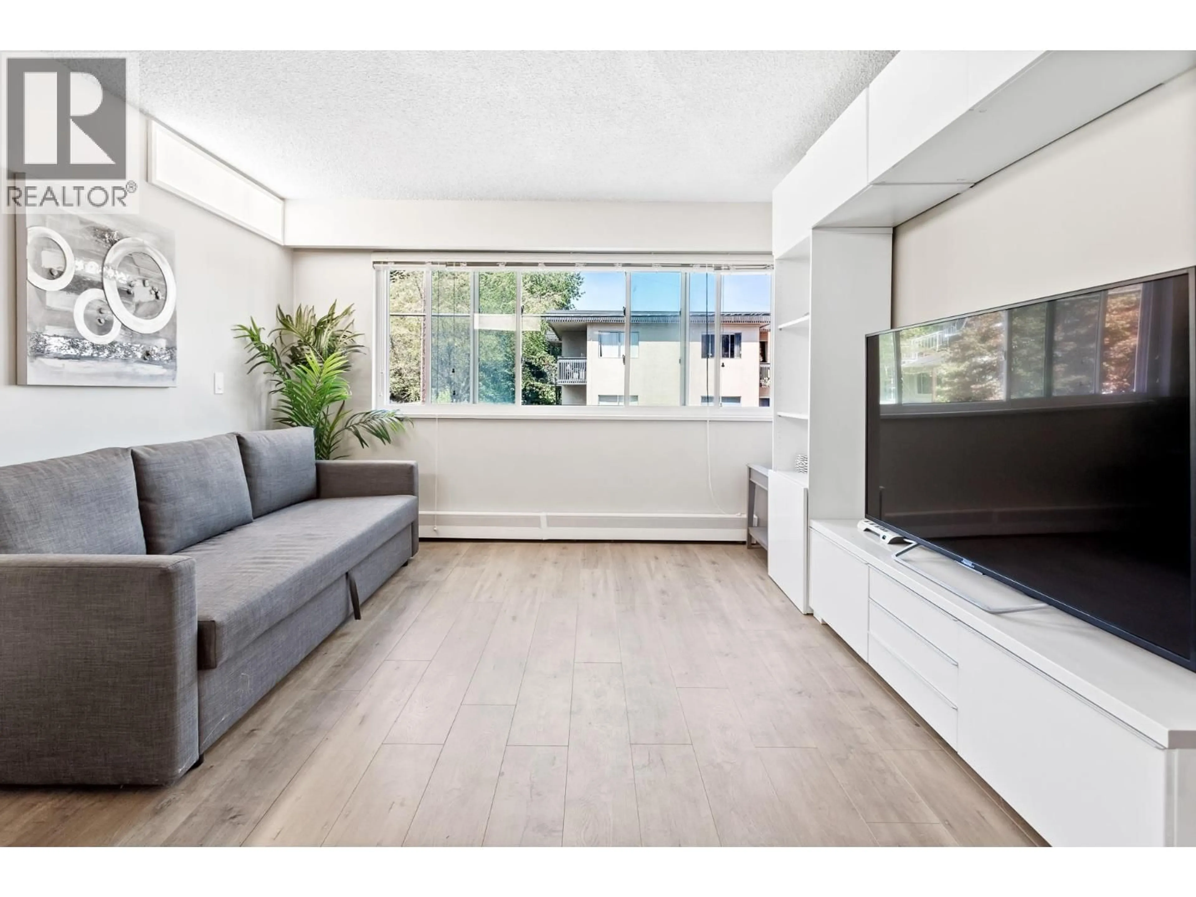 Living room with furniture, unknown for 206 - 1149 11TH AVENUE, Vancouver British Columbia V6H1K4