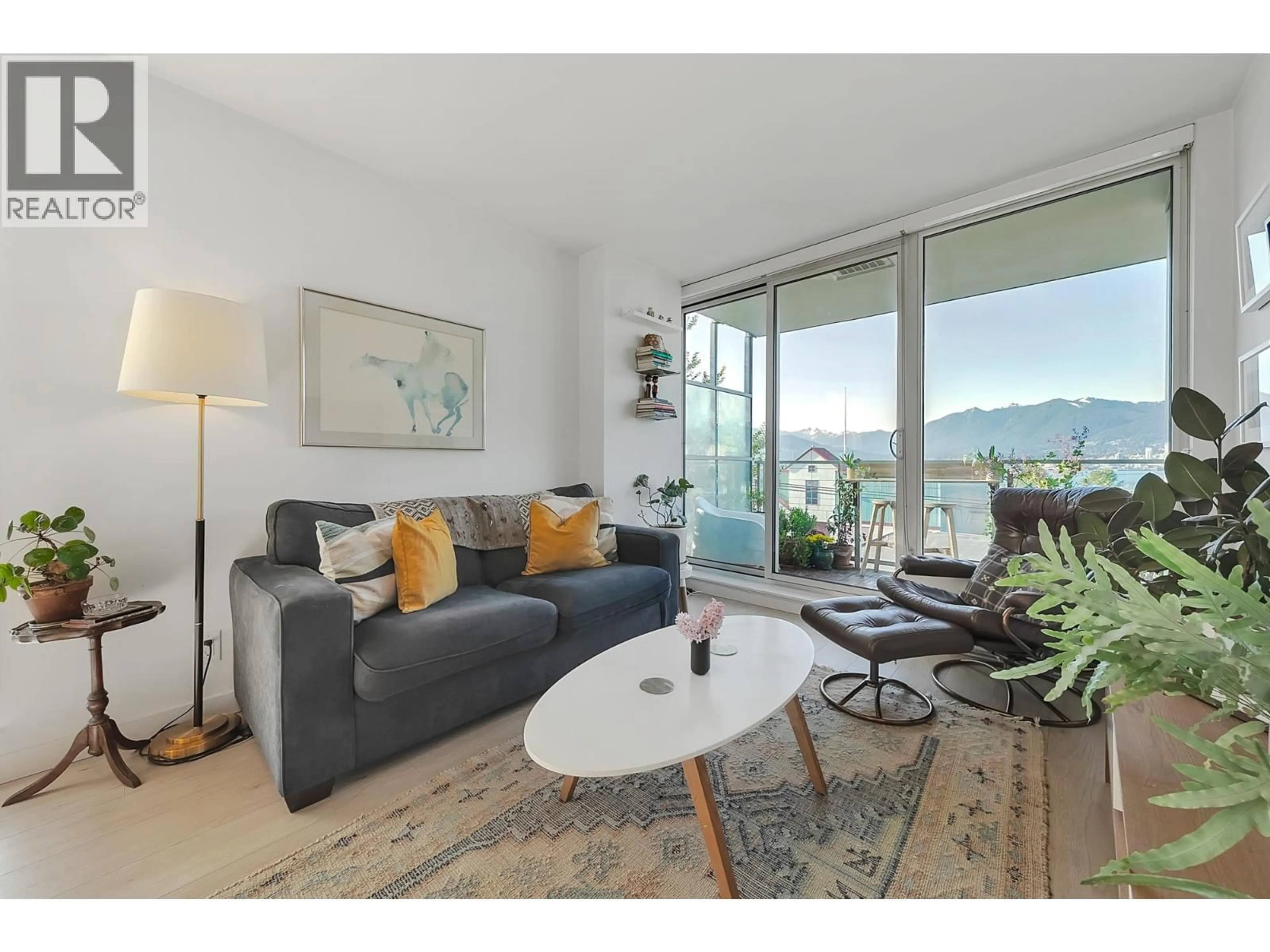 Living room with furniture, wood/laminate floor for 302 - 933 HASTINGS STREET, Vancouver British Columbia V6A0G6