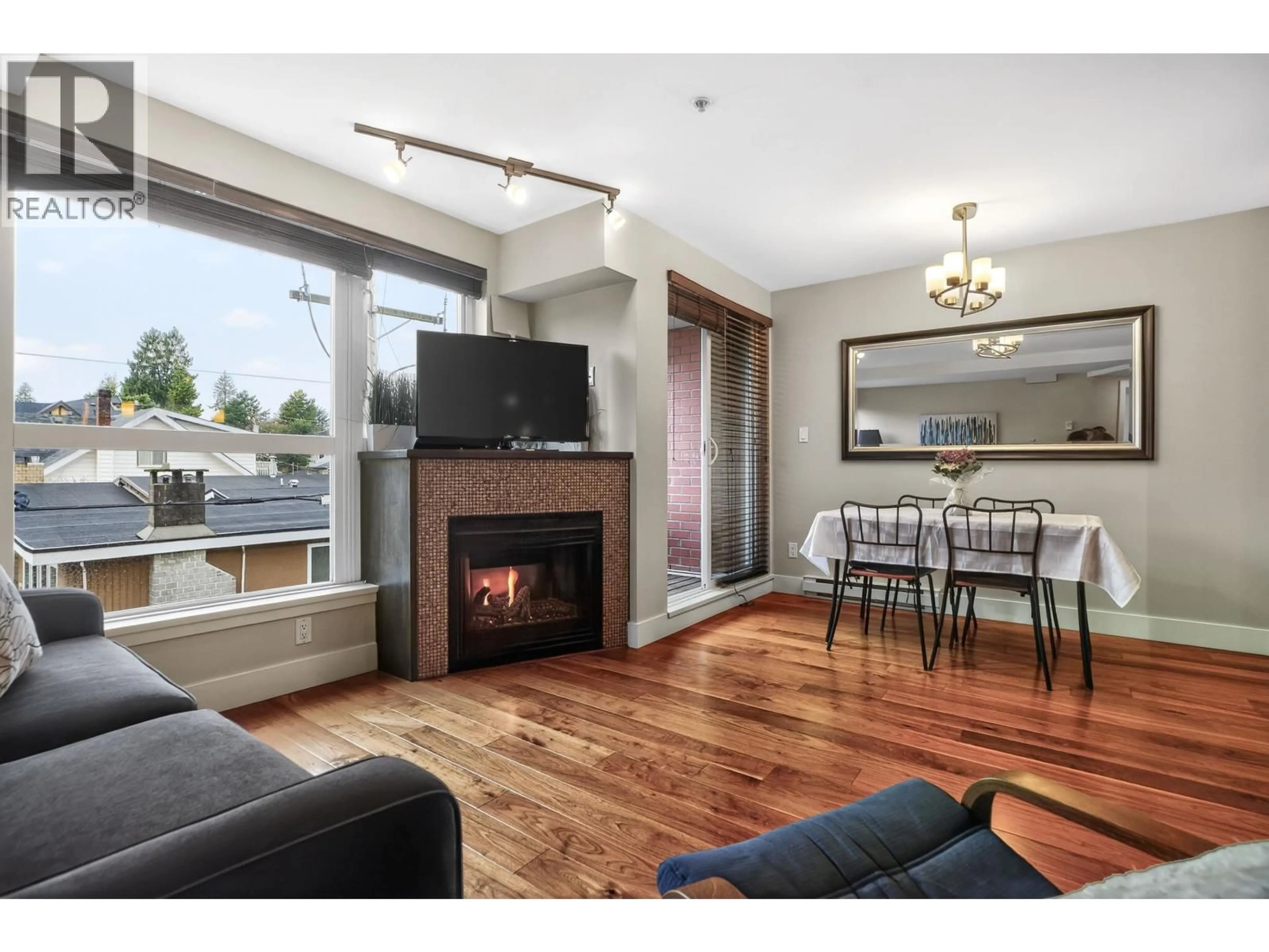 Living room with furniture, wood/laminate floor for 401 - 3611 18TH AVENUE, Vancouver British Columbia V6S1B3
