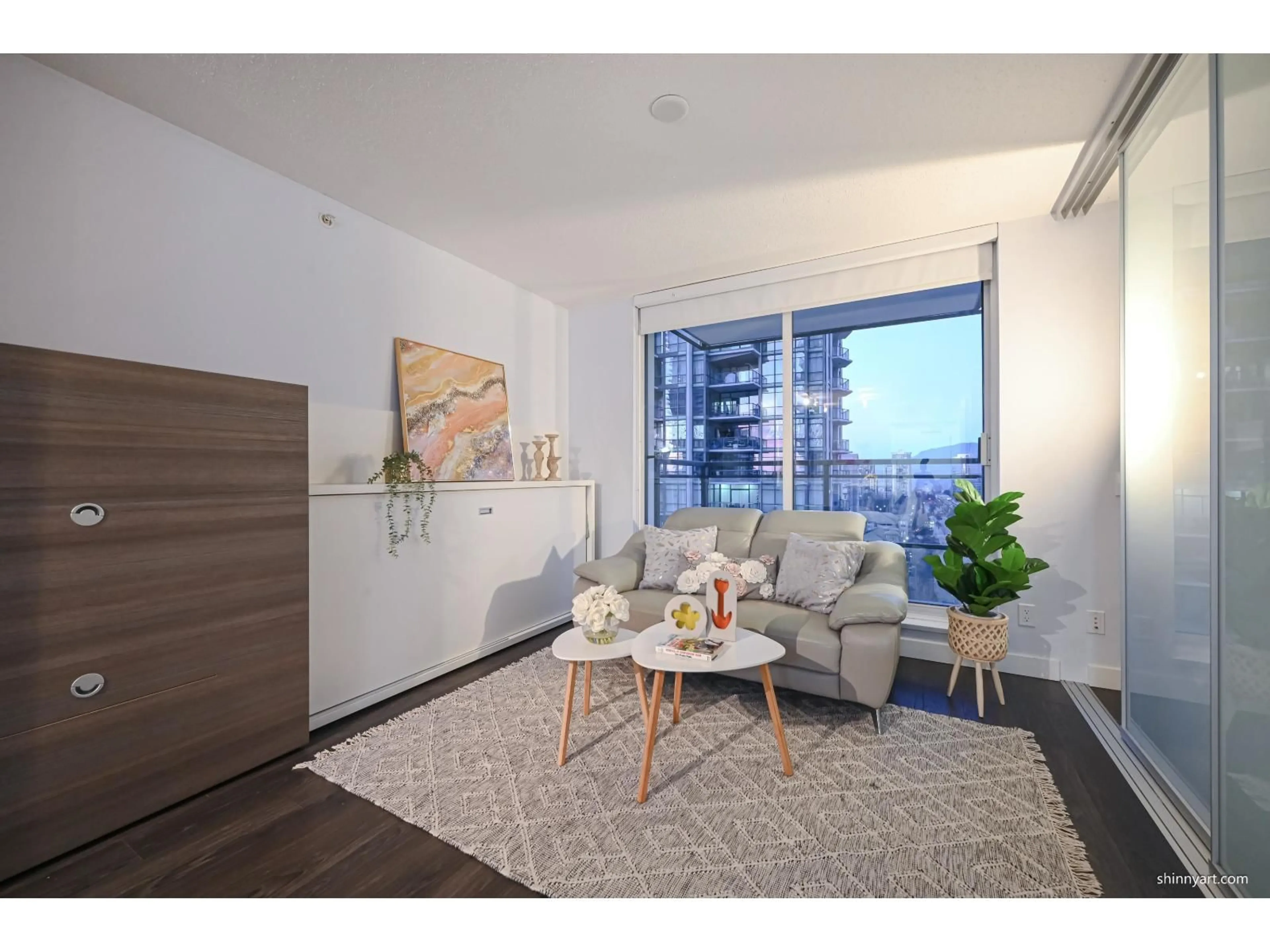 Living room with furniture, wood/laminate floor for 1507 - 13398 104 AVENUE, Surrey British Columbia V3T1V6