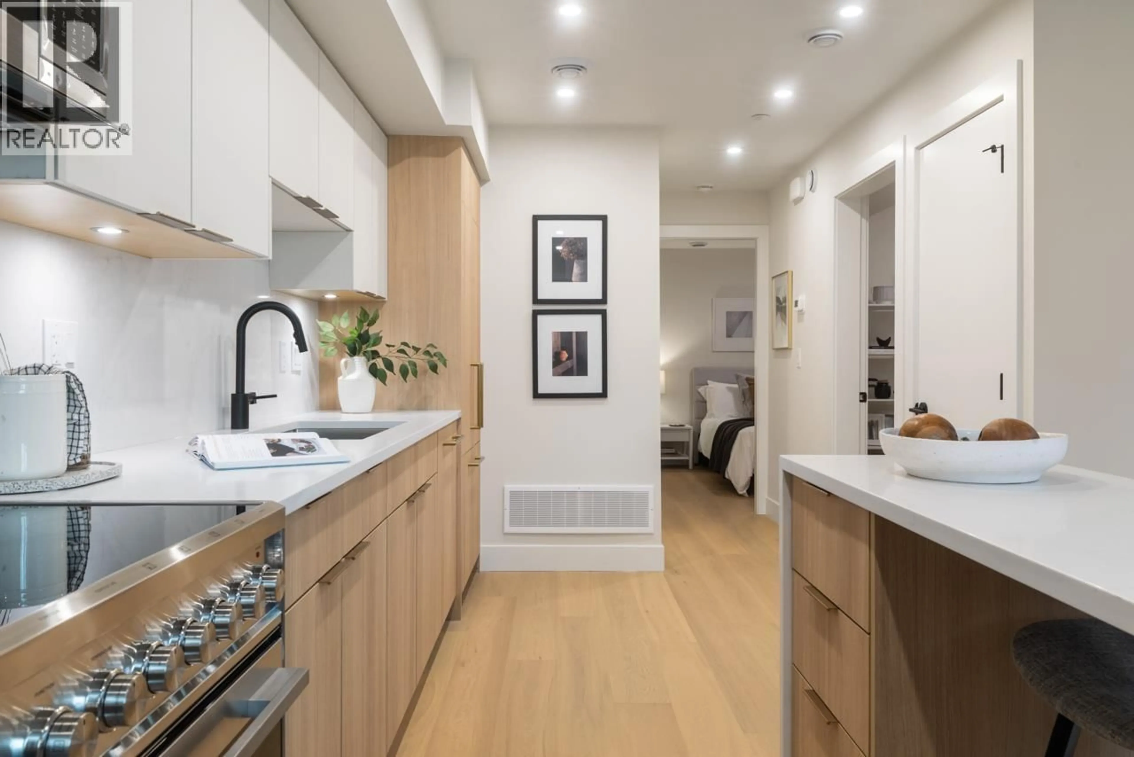 Open concept kitchen, wood/laminate floor for 1 - 1937 TEMPLETON DRIVE, Vancouver British Columbia V5N4V9