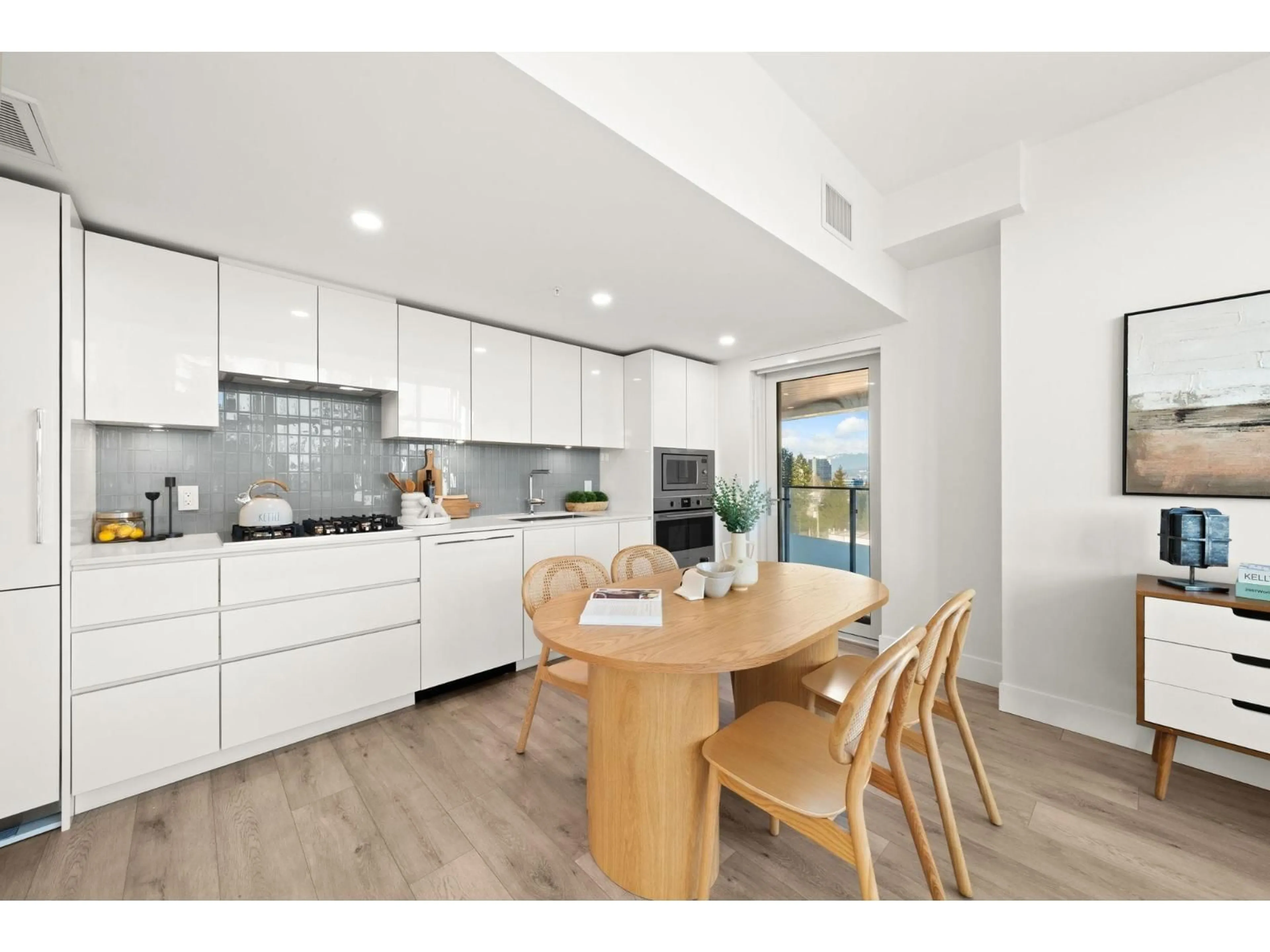 Open concept kitchen, wood/laminate floor for 610 - 10428 WHALLEY BOULEVARD, Surrey British Columbia V3T0W2