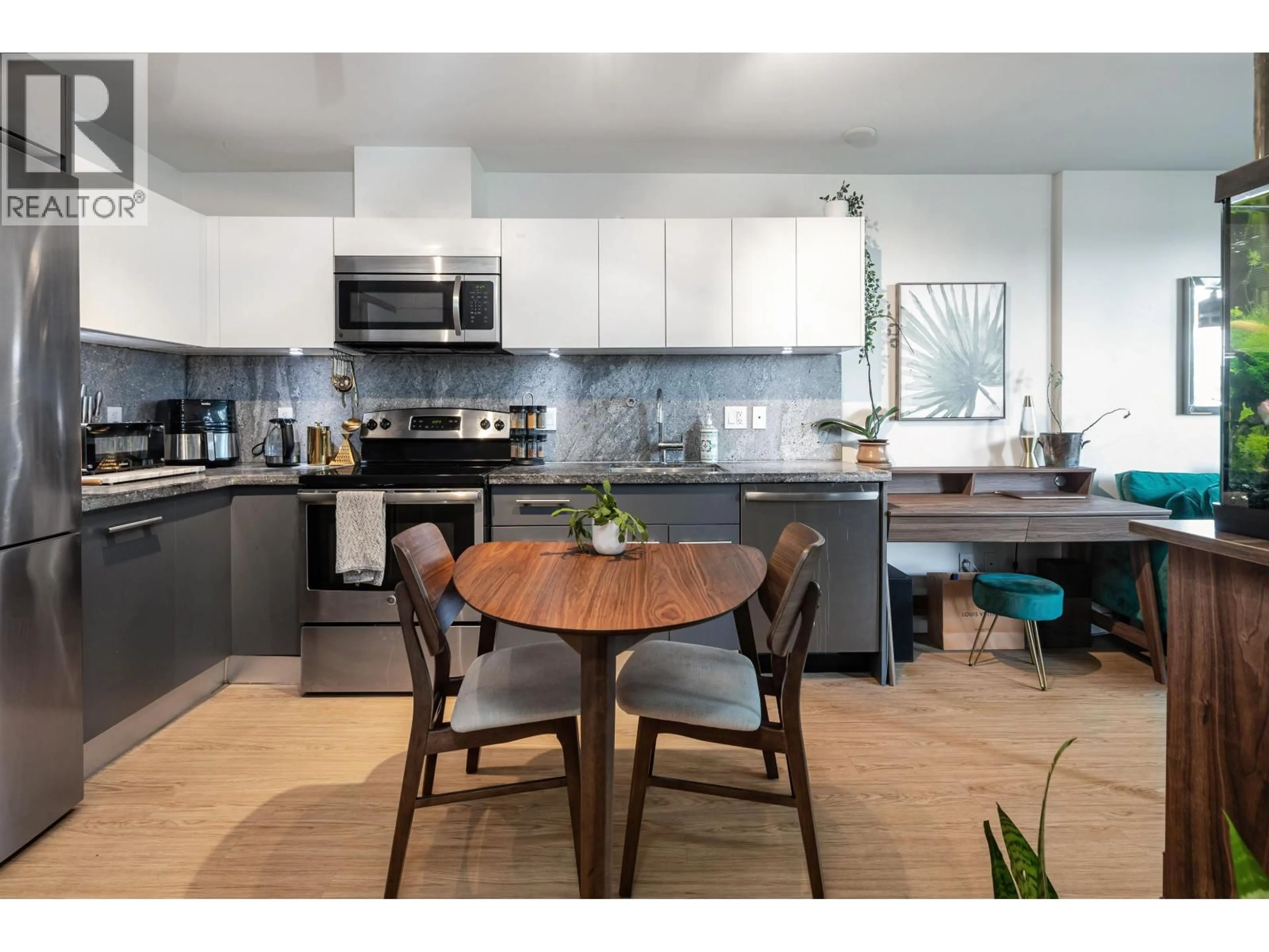 Open concept kitchen, wood/laminate floor for 601 - 188 KEEFER STREET, Vancouver British Columbia V6A0E3