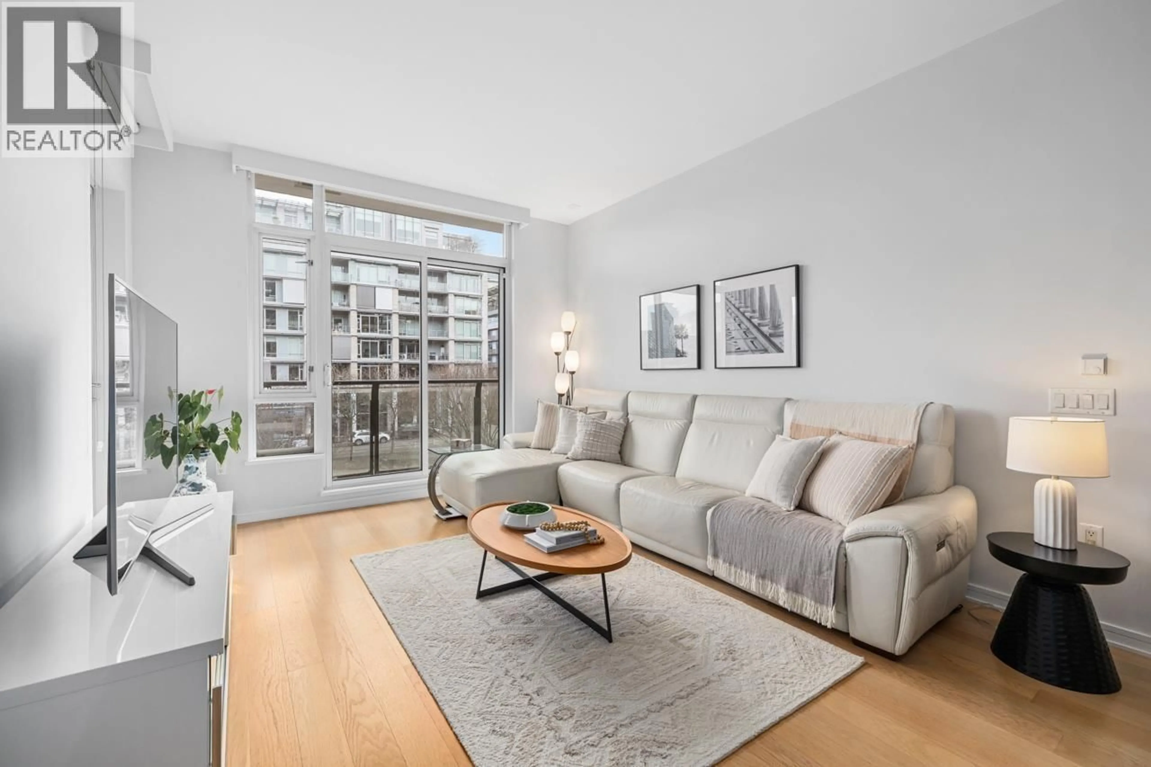 Living room with furniture, unknown for 302 - 1625 MANITOBA STREET, Vancouver British Columbia V5Y0B8