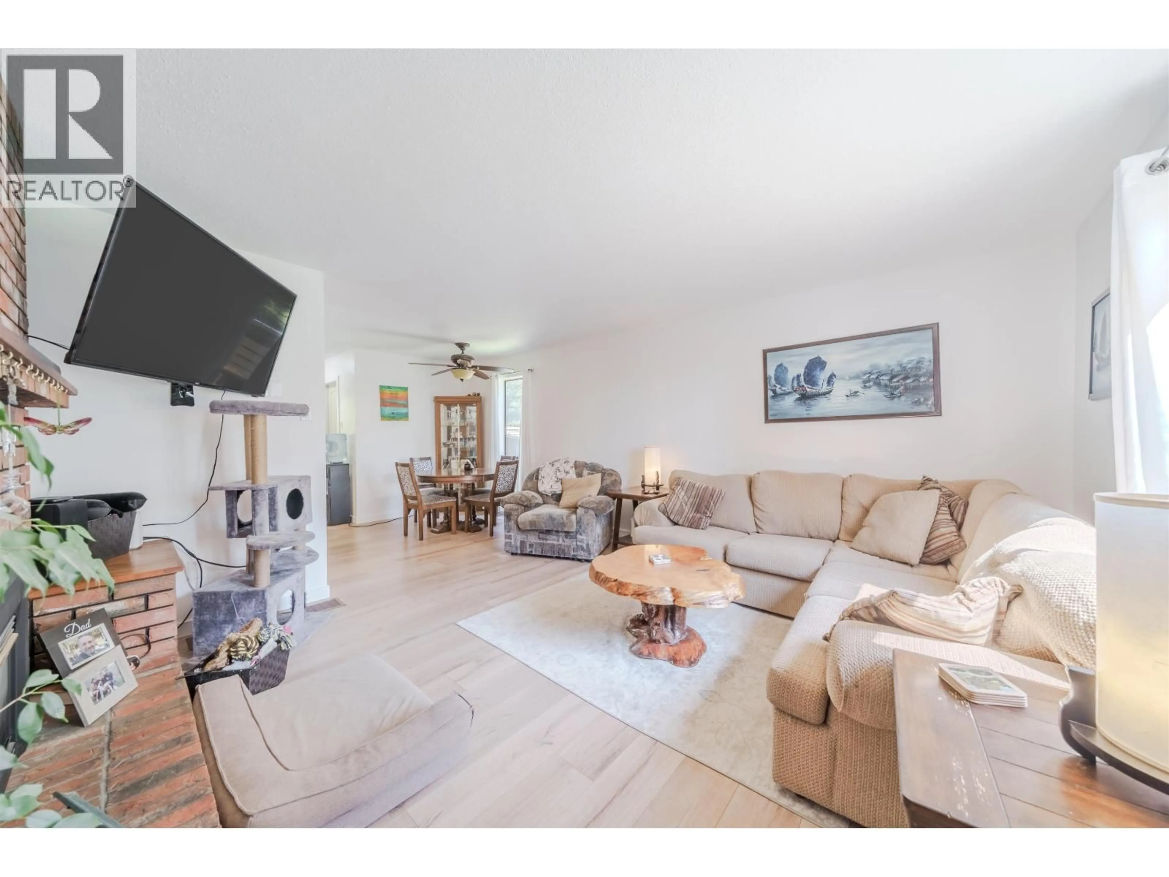 Living room with furniture, unknown for 4927 GLOINNZUN CRESCENT, 108 Mile Ranch British Columbia V0K2Z0