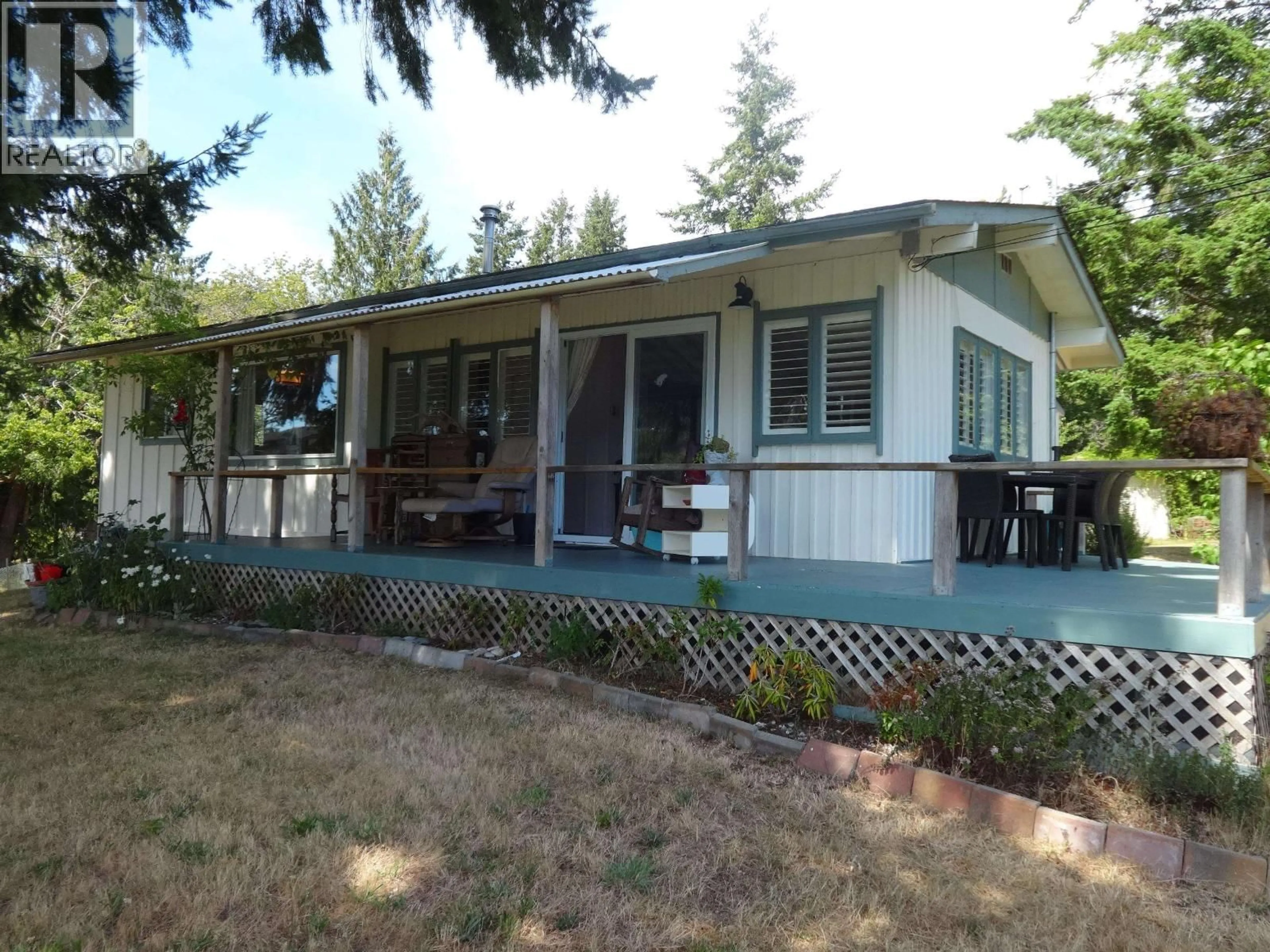 Home with vinyl exterior material, unknown for 13173 SEXW'AMIN STREET, Garden Bay British Columbia V0N1S0