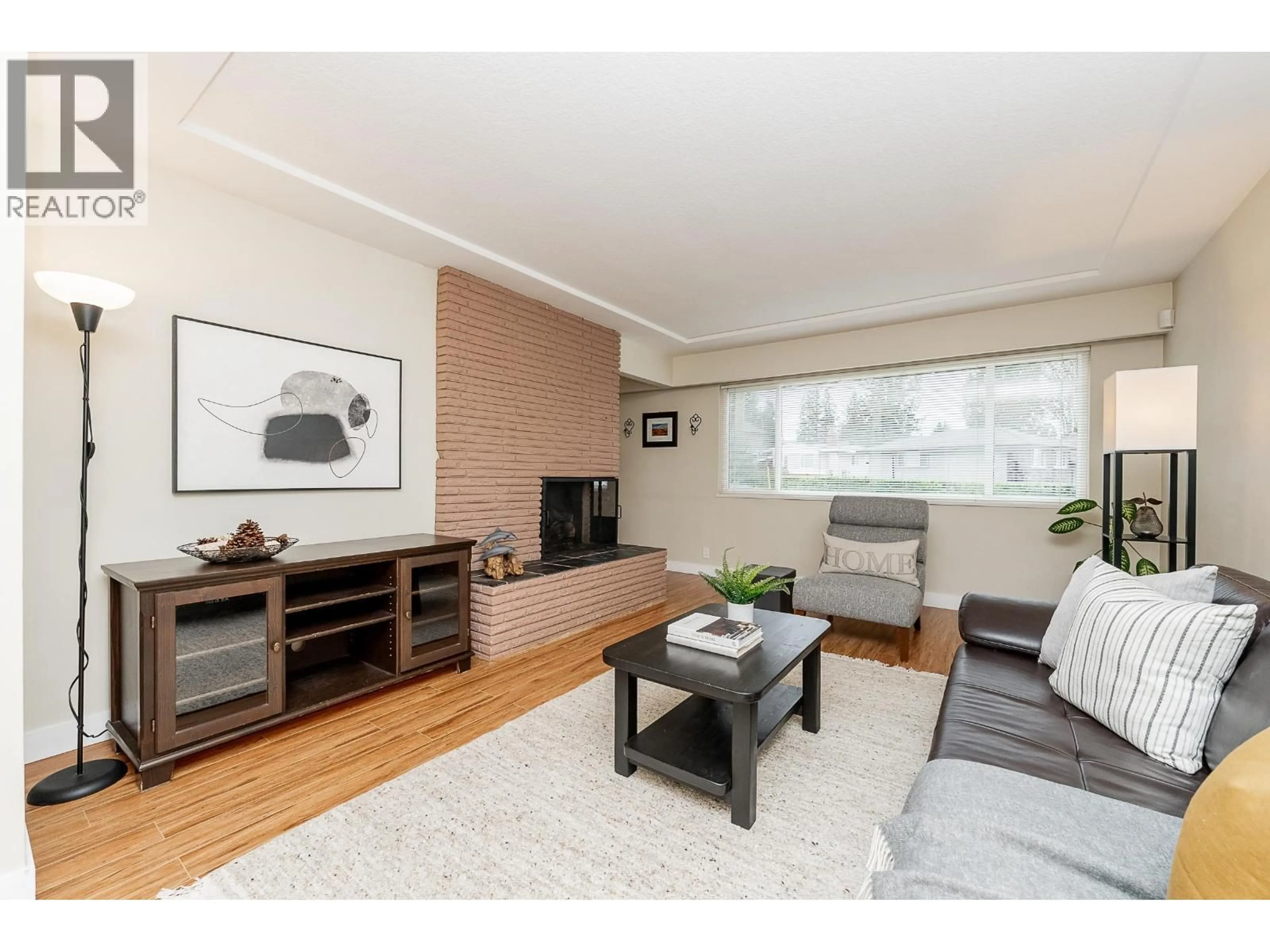 Living room with furniture, wood/laminate floor for 1771 RIDEAU AVENUE, Coquitlam British Columbia V3J3G9