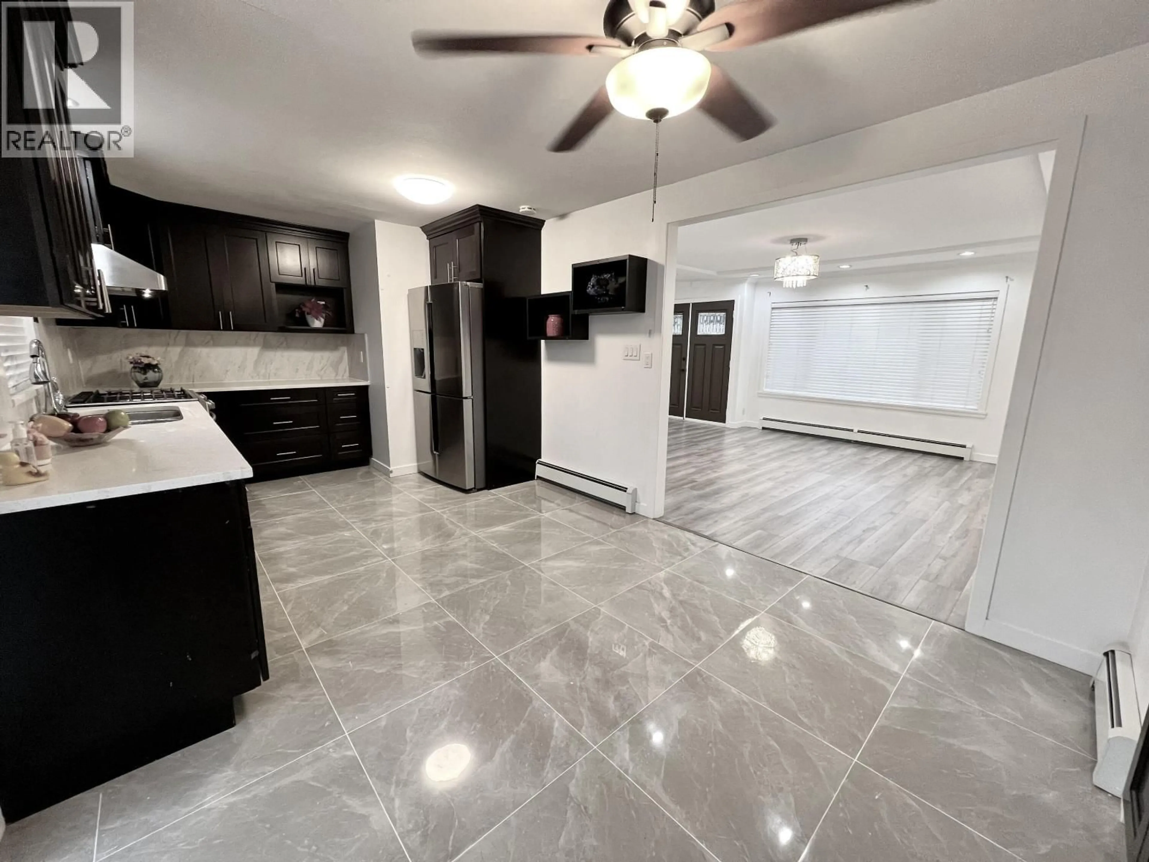 Open concept kitchen, ceramic/tile floor for 7768 18TH AVENUE, Burnaby British Columbia V3N1J2