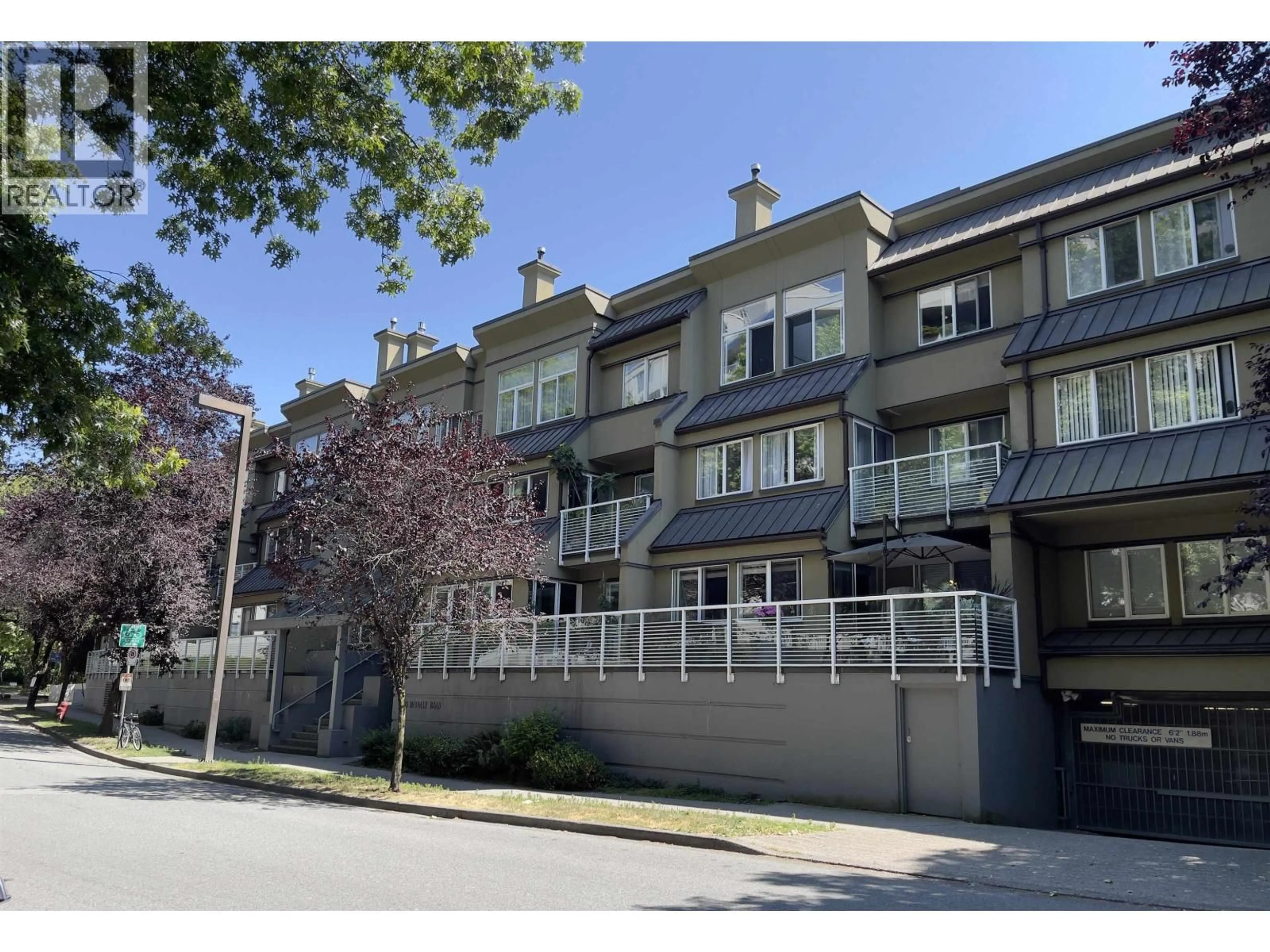 A pic from outside/outdoor area/front of a property/back of a property/a pic from drone, street for 203 - 650 MOBERLY ROAD, Vancouver British Columbia V5Z4J1