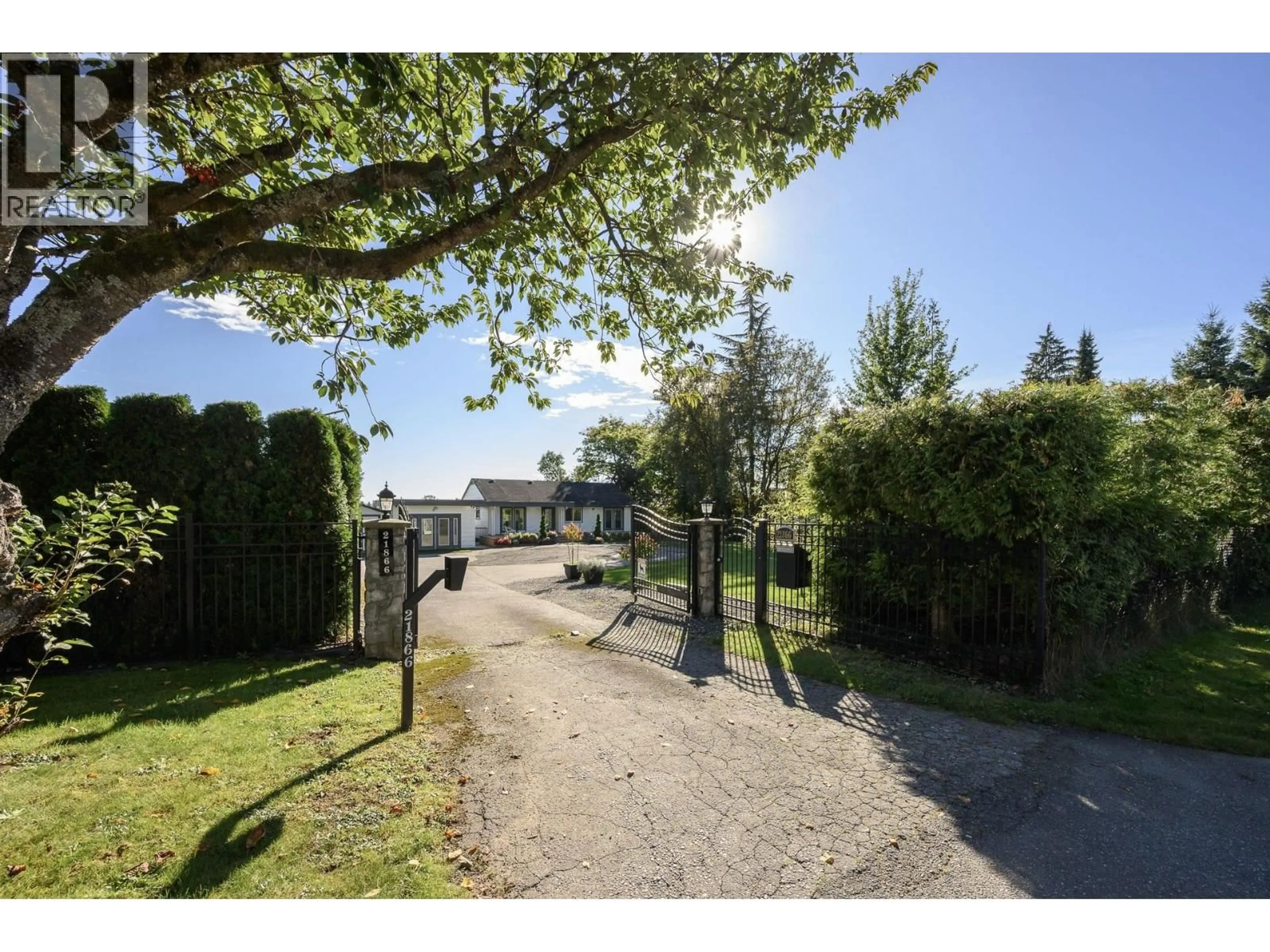 A pic from outside/outdoor area/front of a property/back of a property/a pic from drone, street for 21866 RIVER ROAD, Maple Ridge British Columbia V2X2C1