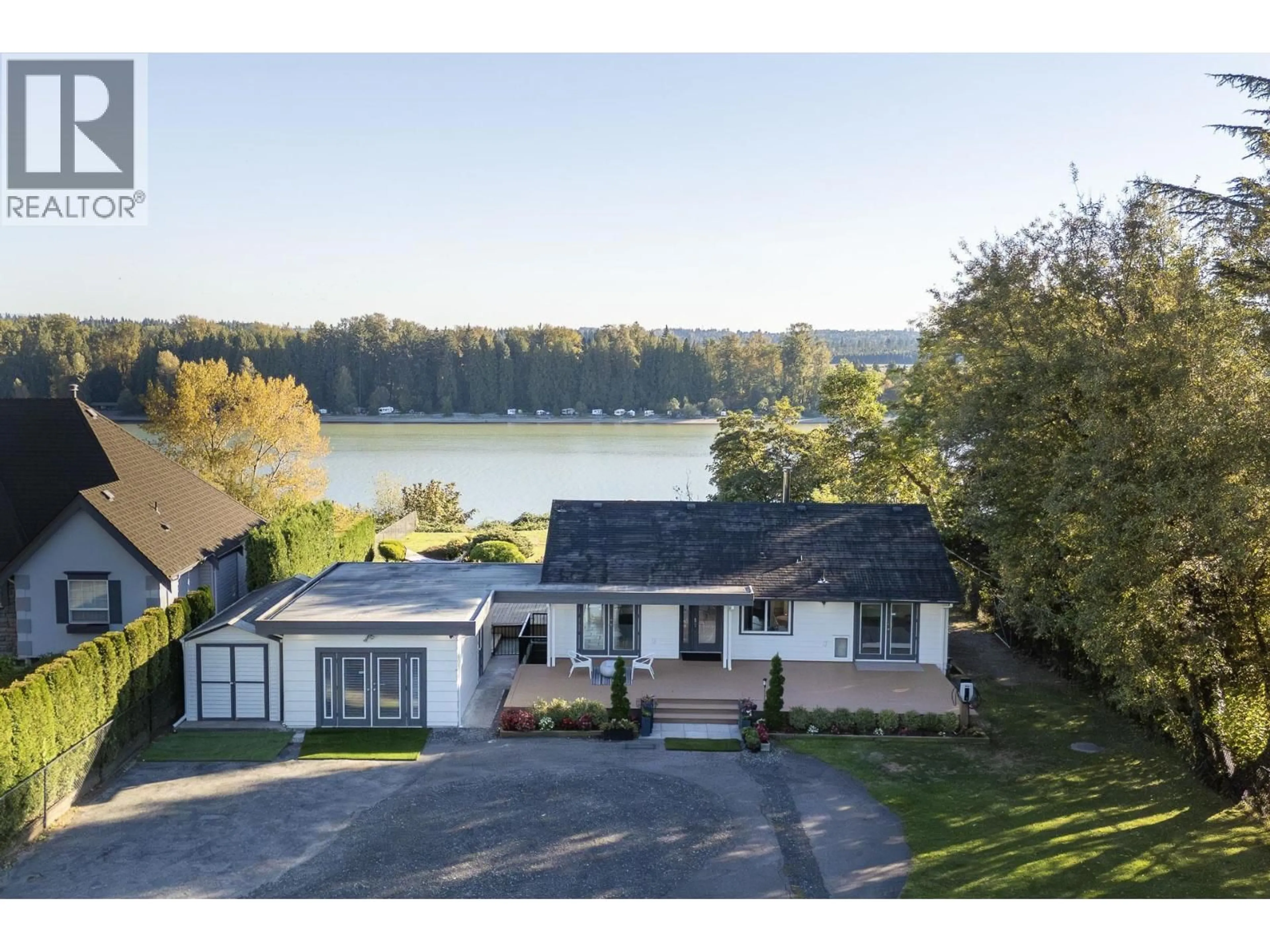 A pic from outside/outdoor area/front of a property/back of a property/a pic from drone, water/lake/river/ocean view for 21866 RIVER ROAD, Maple Ridge British Columbia V2X2C1