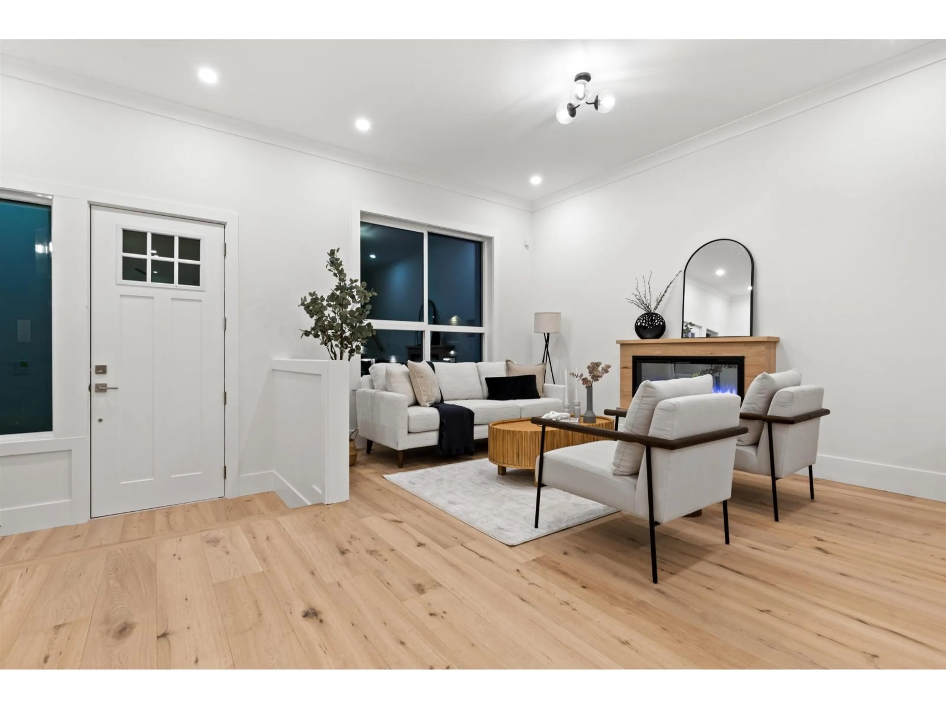 Living room with furniture, wood/laminate floor for 102 - 16623 18A AVENUE, Surrey British Columbia V3Z9X5